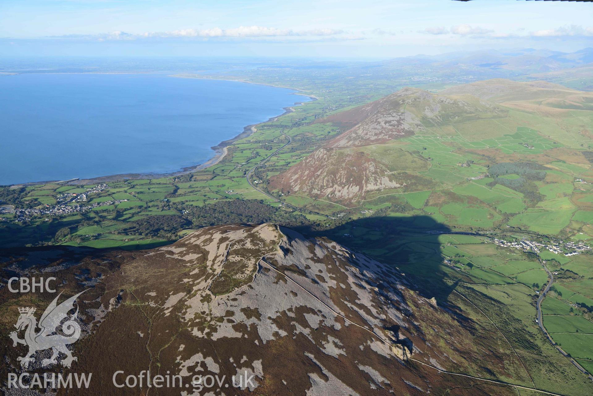 Tre'r Ceiri hillfort, in evening light, wide landscape view