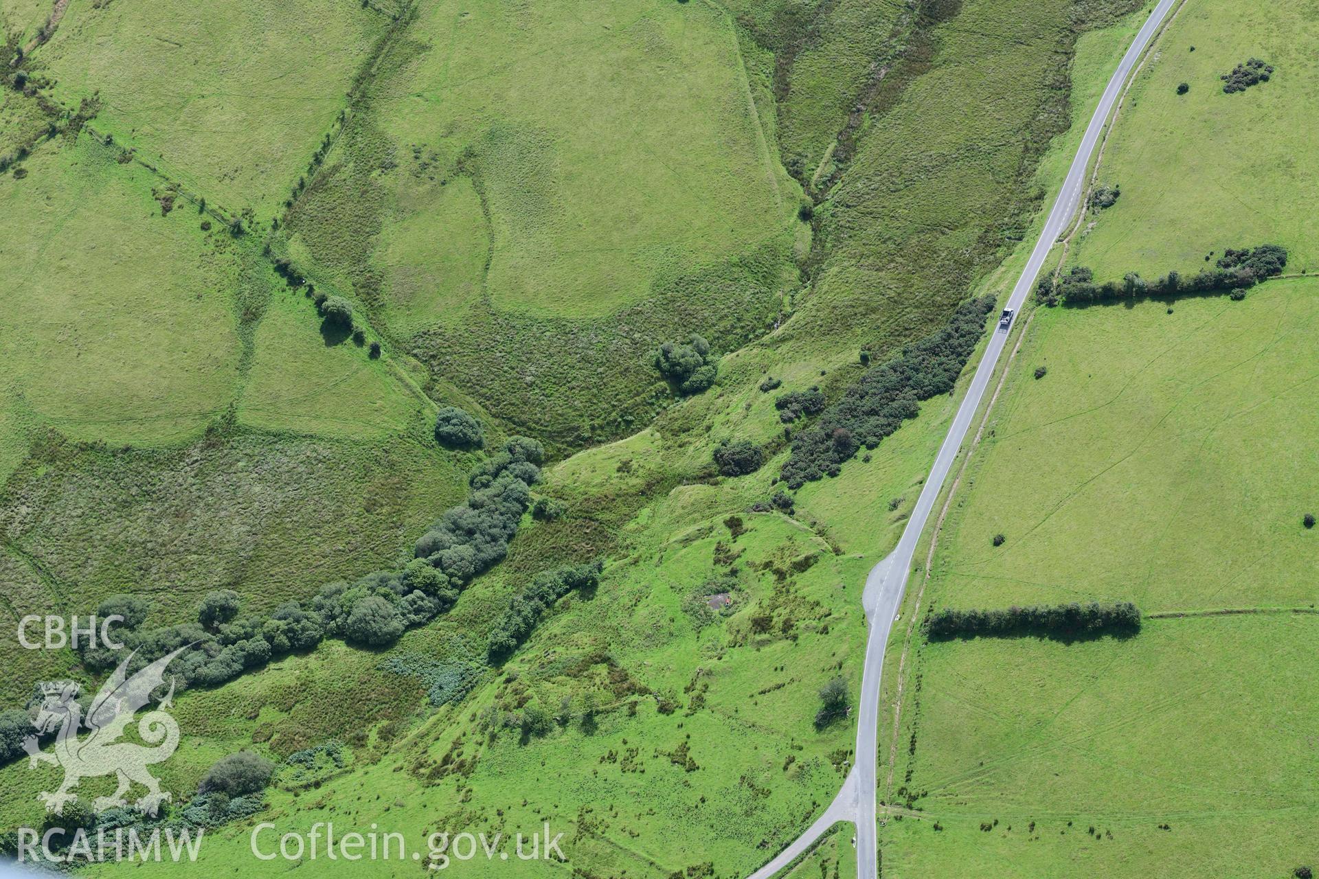 Hirllwyn, military earthworks northwest of deserted farmstead