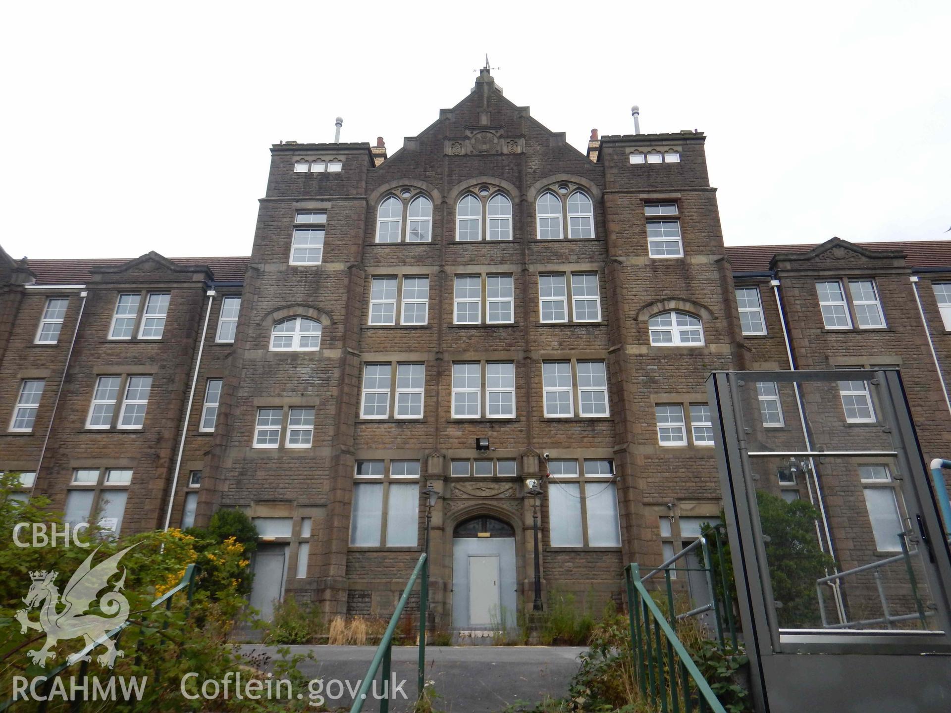 The central bays of the front elevation, including the main entrance, looking north. Photograph from an Archaeological Level 3 Building Recording for The Former Women’s Training College, UWSTD Townhill Campus, Townhill Road, Swansea. Dated 2021. Project: AW2915.