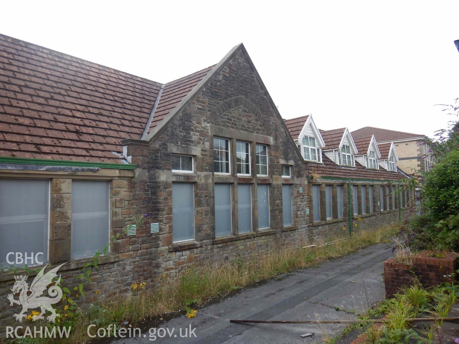 Western end of the north-facing elevation of the rear range, looking south-west. Photograph from an Archaeological Level 3 Building Recording for The Former Women’s Training College, UWSTD Townhill Campus, Townhill Road, Swansea. Dated 2021. Project: AW2915.