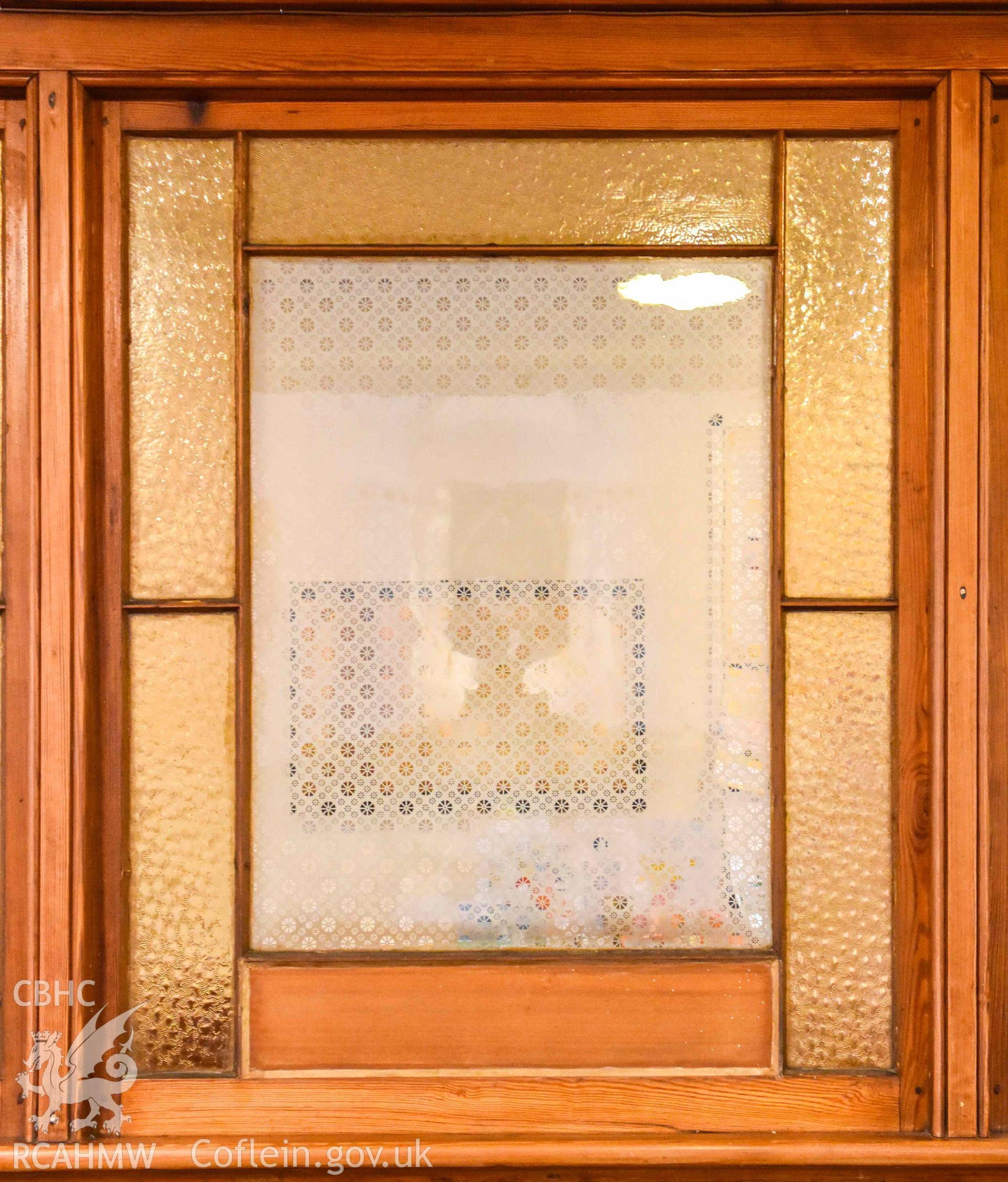 Ebenezer Calvinistic Methodist Chapel - Detailed view of a frosted window between the foyer and nave, taken from South-West