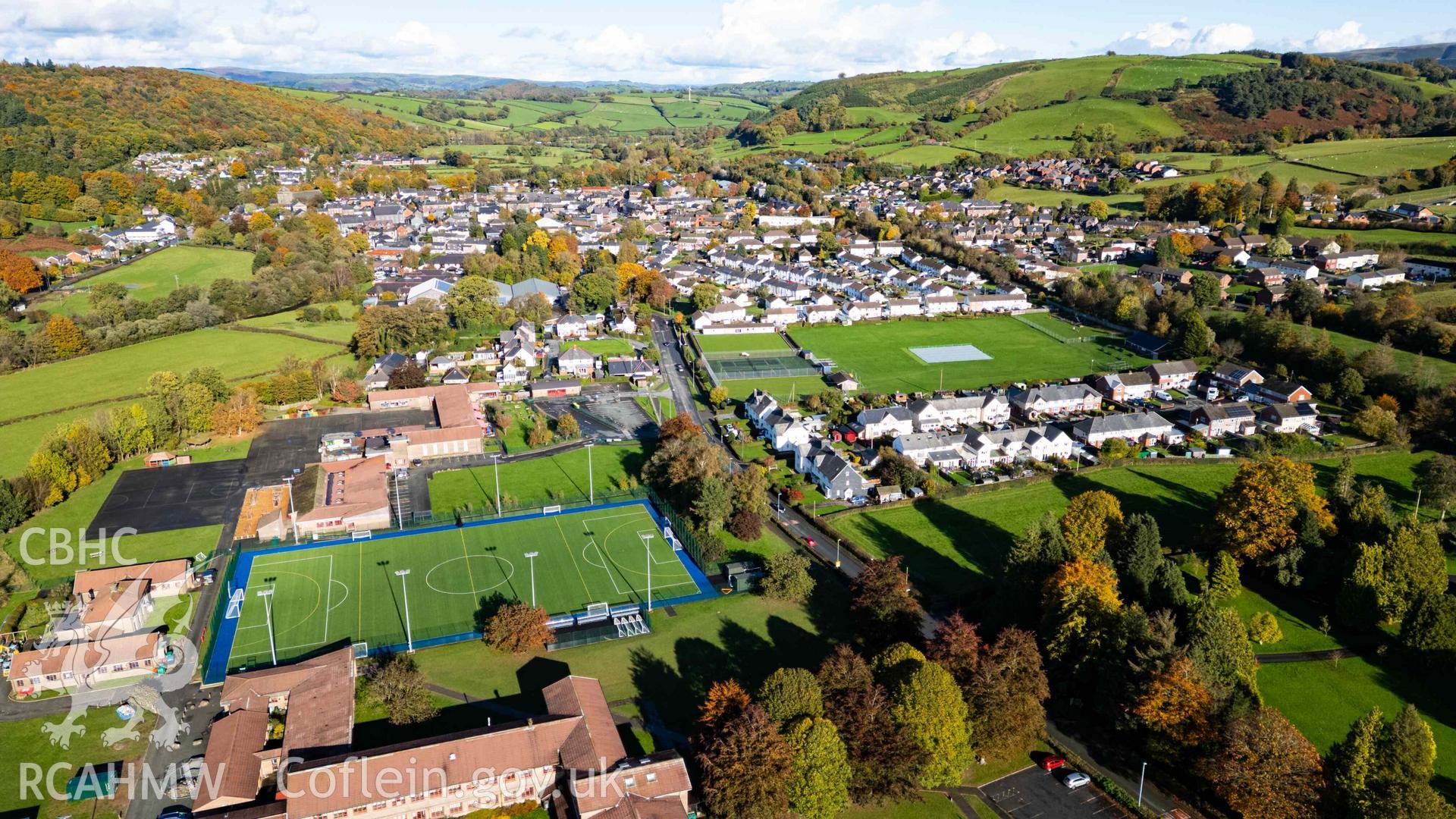 Oblique aerial view of Llanidloes High School looking north towards junior school and town