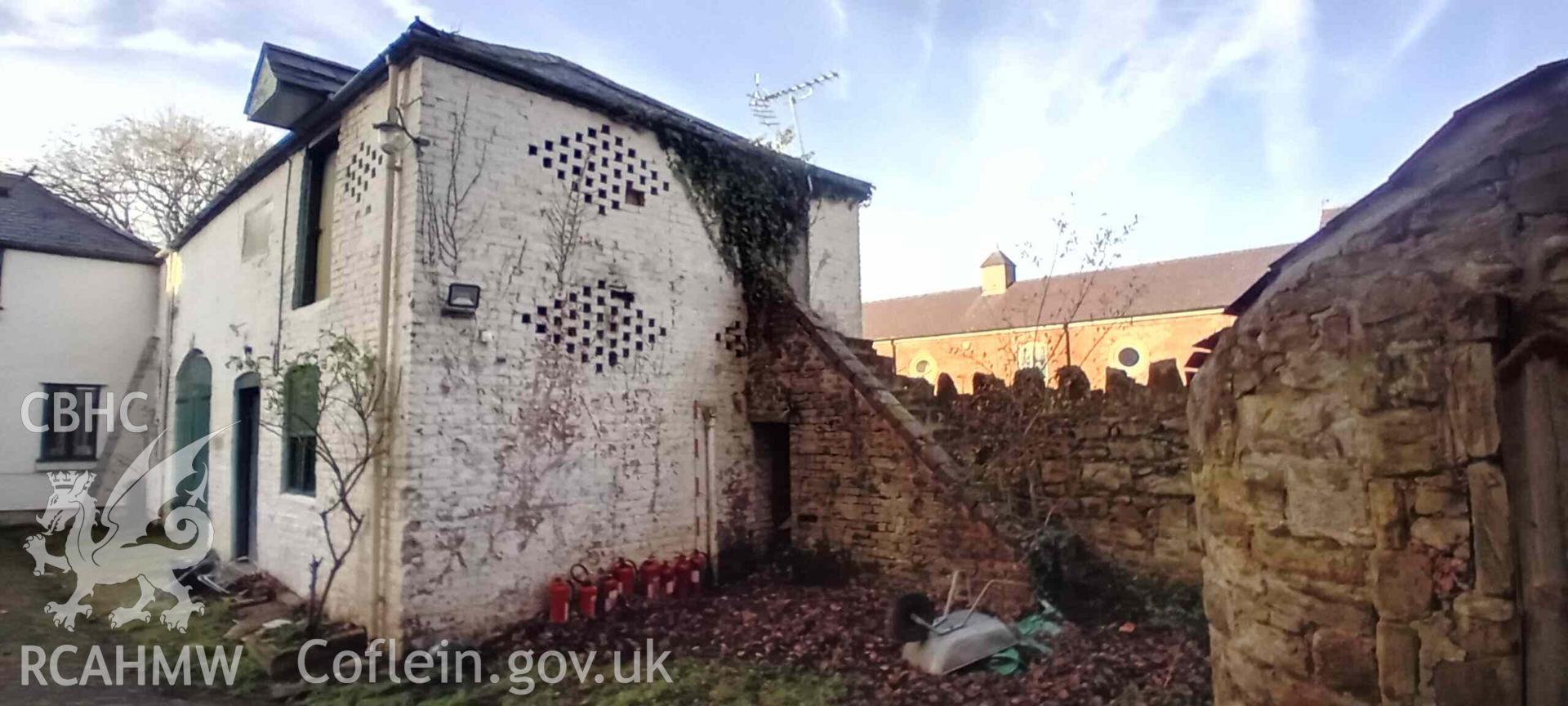 Photograph from a Level 2 Building Recording at the coach house and stables, Bryn Edwin Hall Residential Home, Northop Road, Flint Mountain. Dated 2024. Project: AW3184.