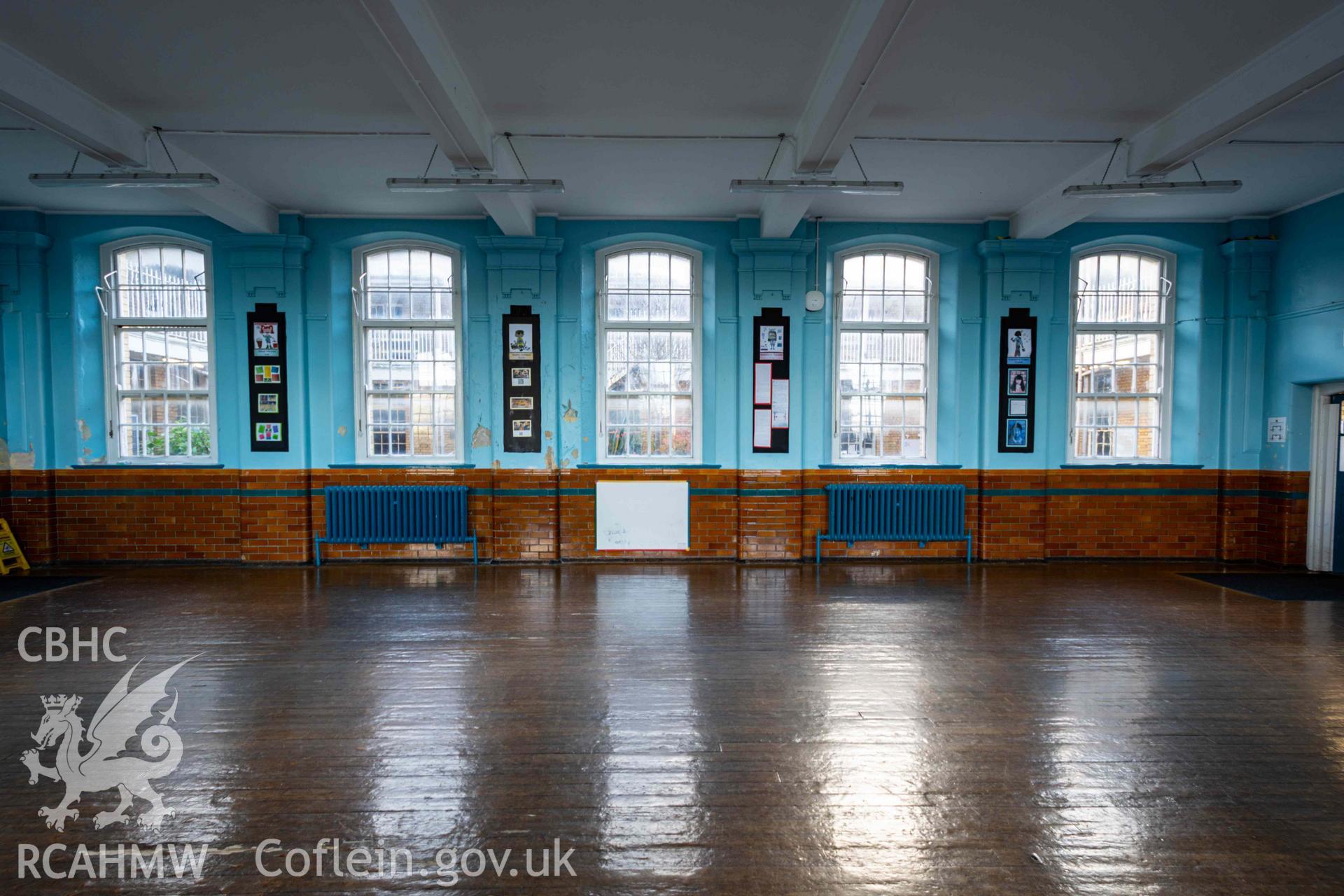 View across gym / dining room, looking south  at long elevation window