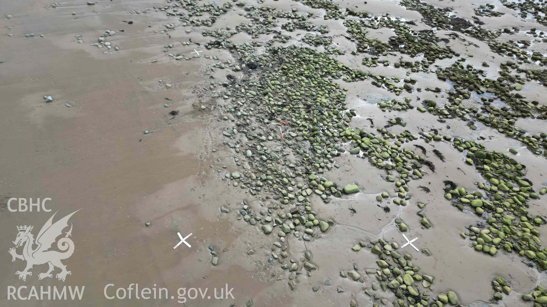 Oblique view of the shipwreck on Llandanwg Beach, looking south on 28/03/2025, scales are 1m.