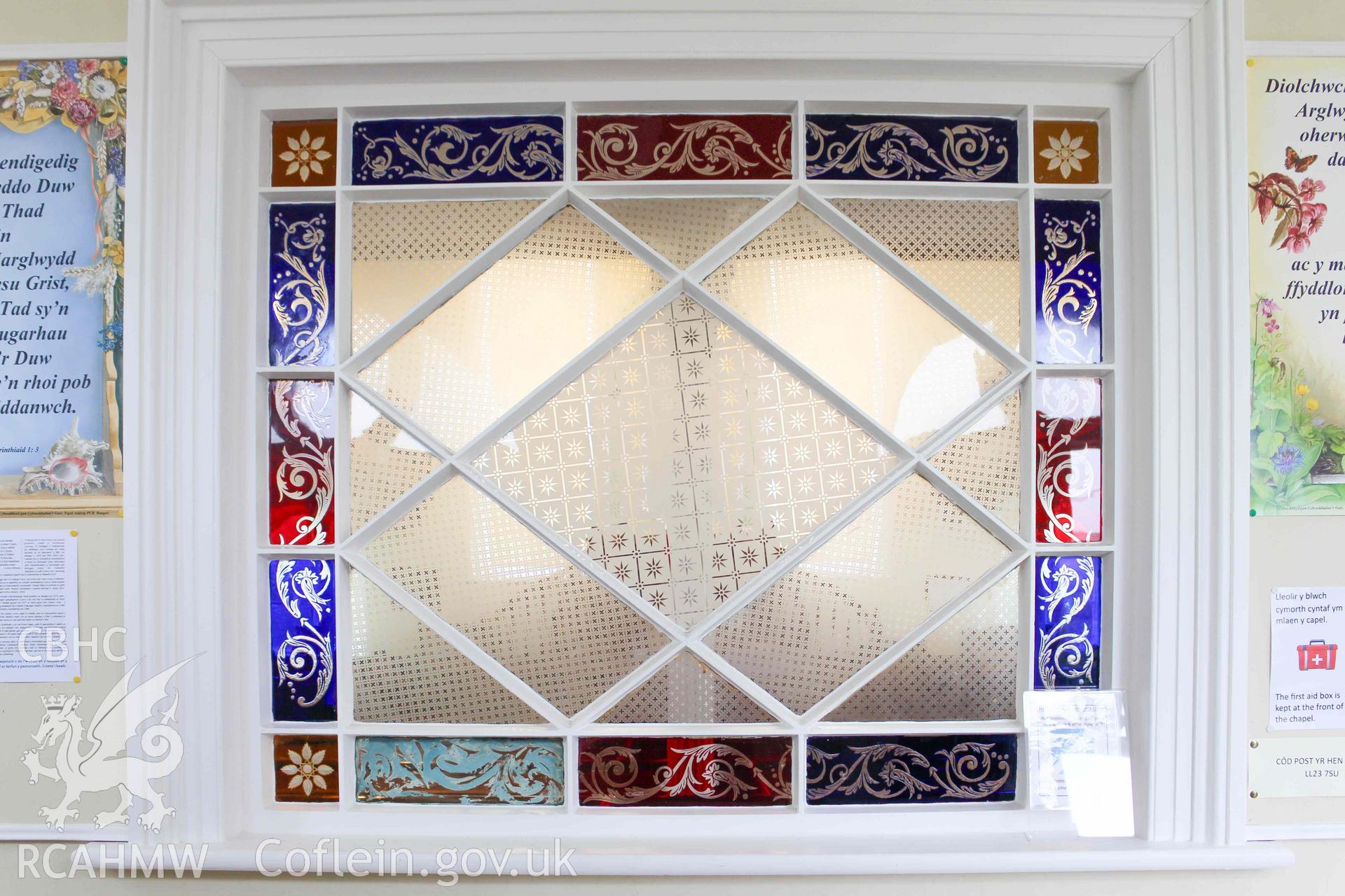 Hen Gapel - View of the stained-glass window between the foyer and nave, taken from South-East