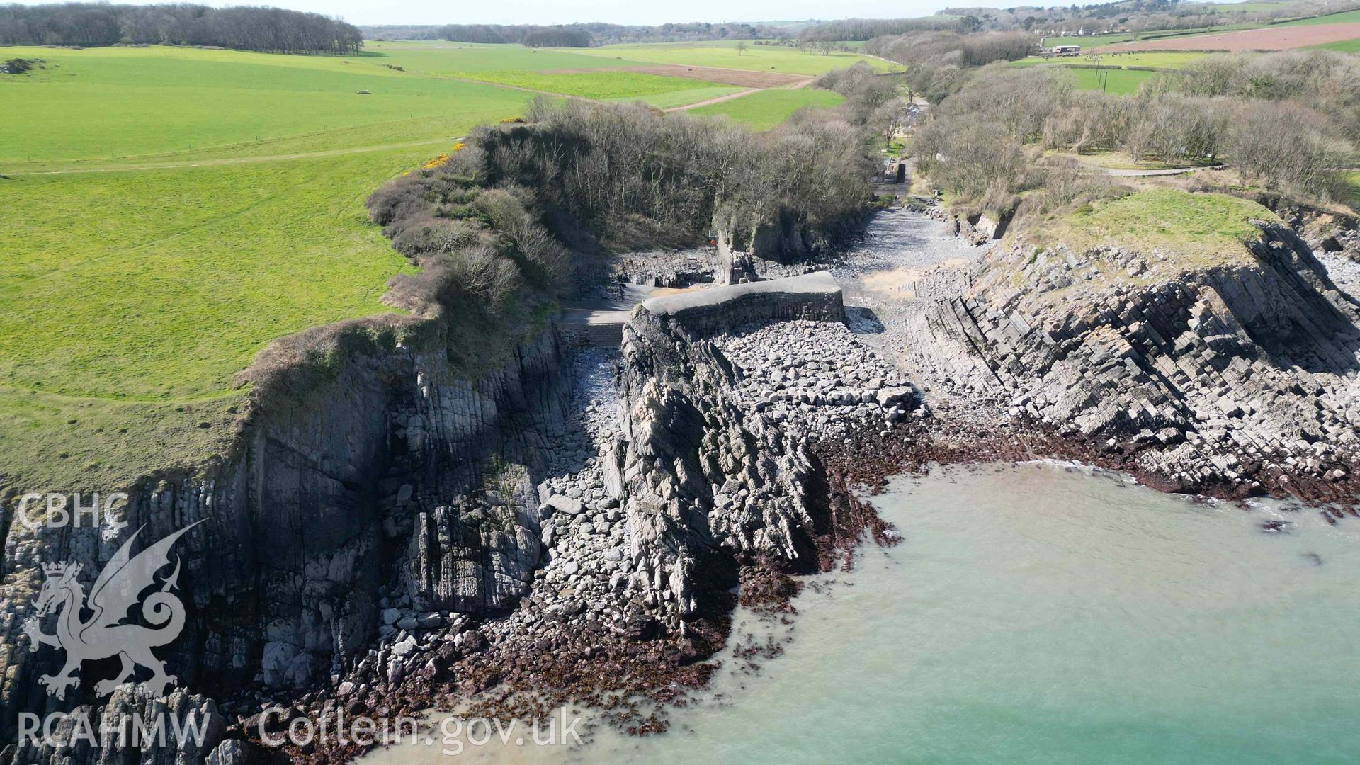 Oblique view of the harbour at Stackpole Quay, looking west on 31/03/2025.
