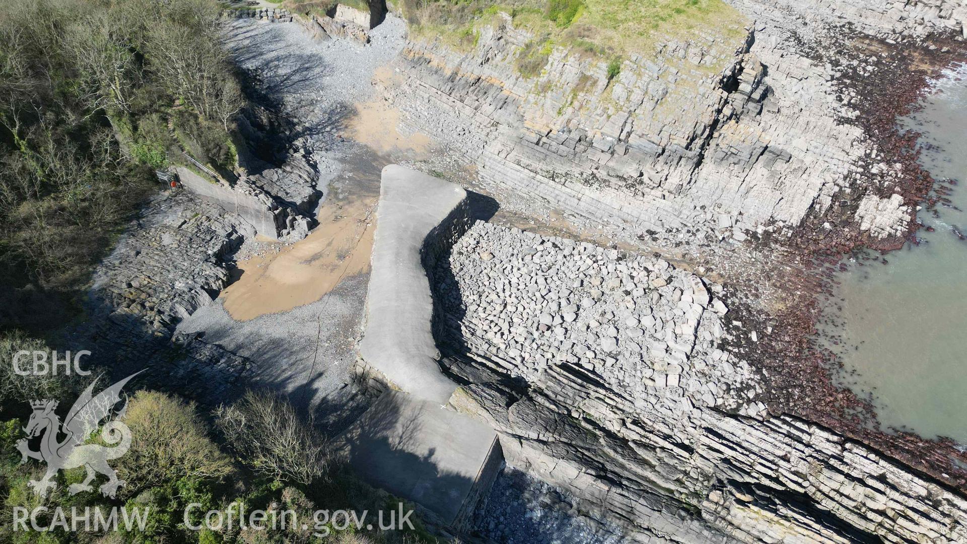 Oblique view of the harbour at Stackpole Quay, looking north-northwest on 31/03/2025.