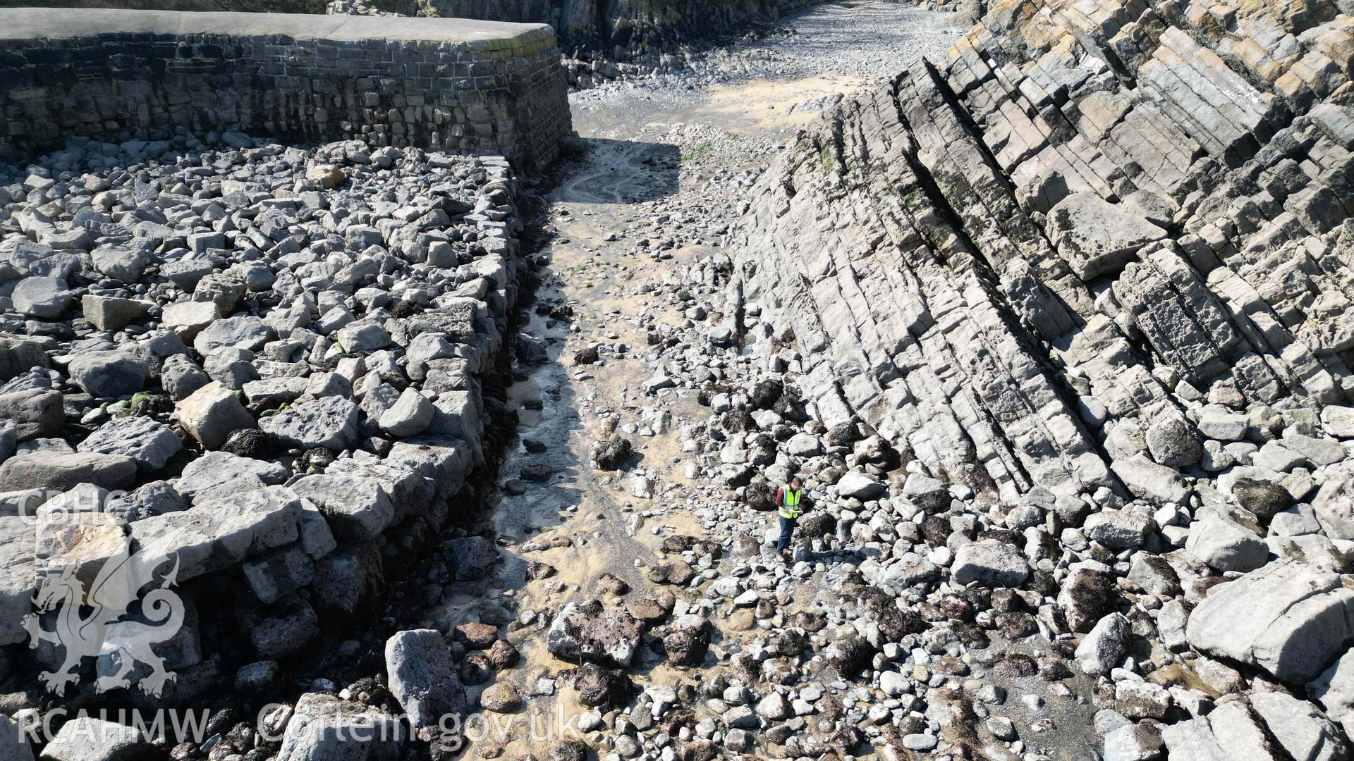 Oblique view looking landward along the main channel into the harbour at Stackpole Quay, at low tide on 31/03/2025.