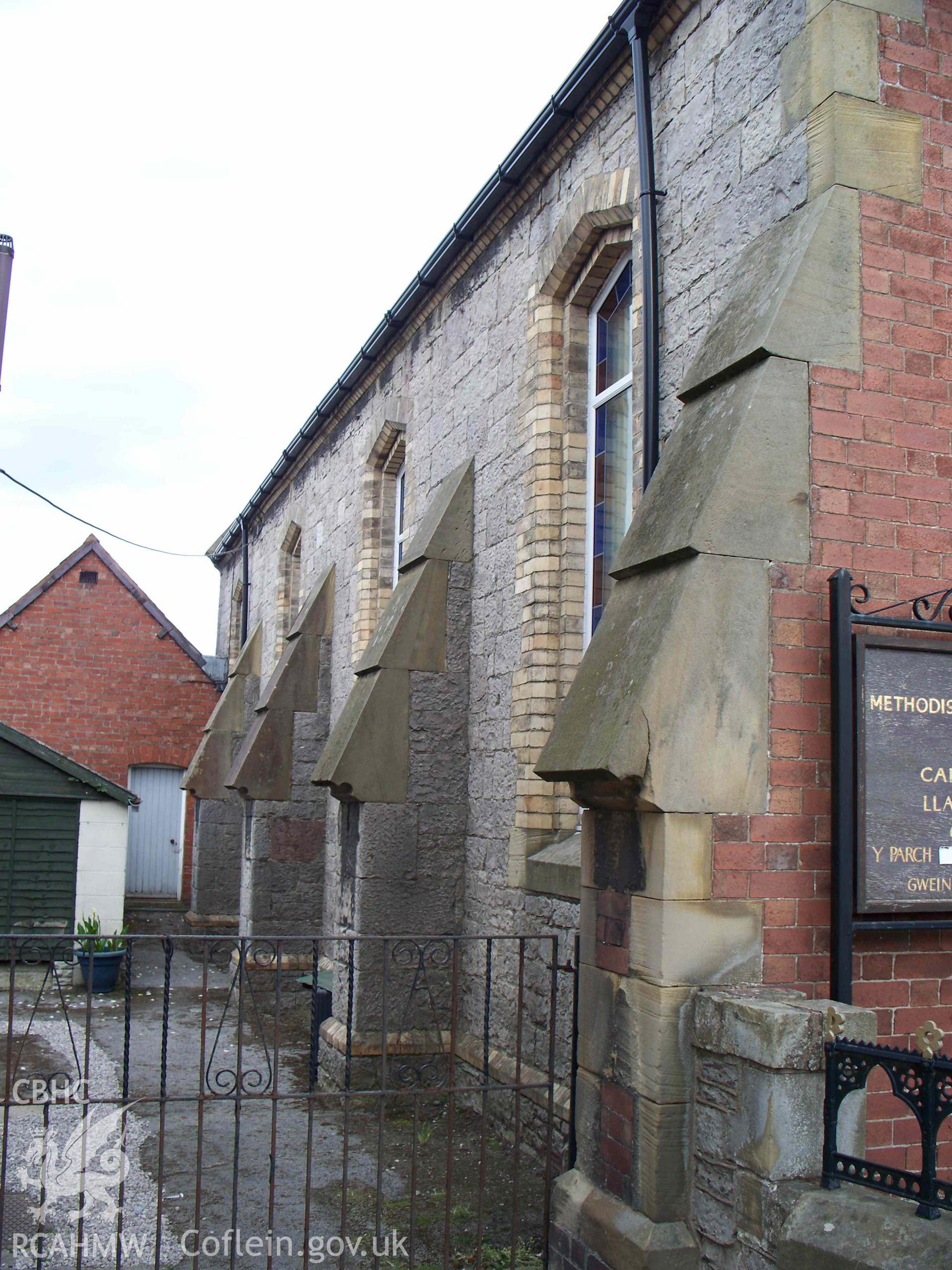 Pentre Welsh Calvinistic Methodist Chapel, Pentre, Llanrhaeadr. Side view. The shallow segmental arches resemble Owens's other designs