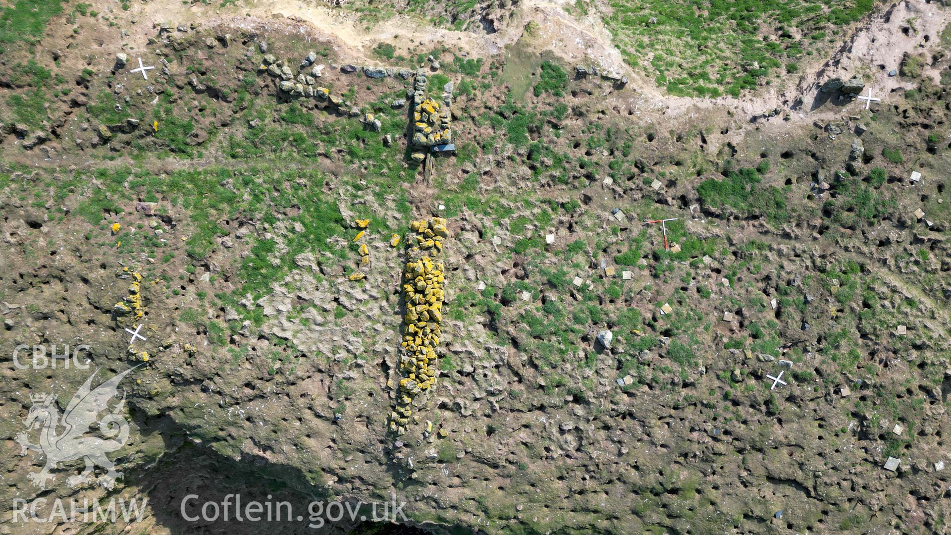 Vertical UAV image showing remains of building and wall on the Neck Isthmus.
