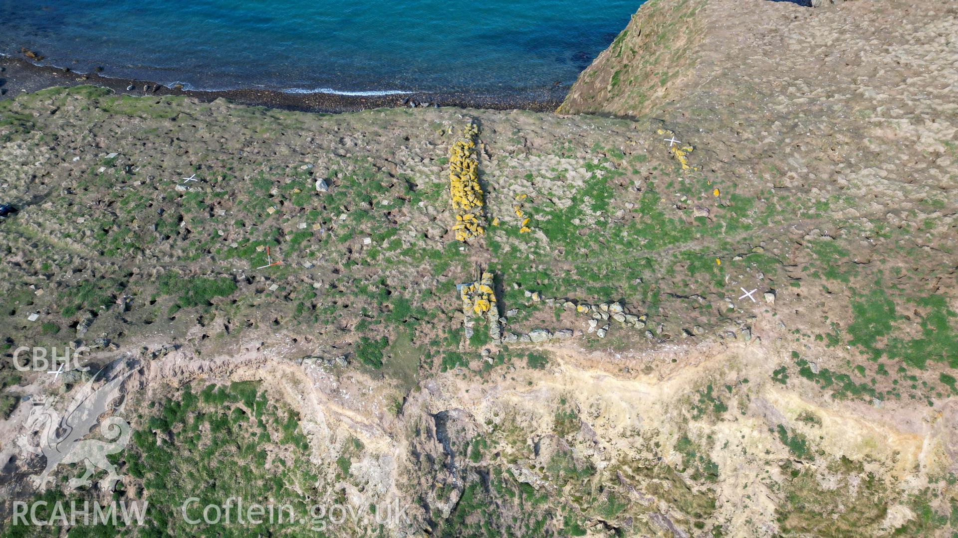 UAV image from the south showing remains of building and  wall on the Neck Isthmus.