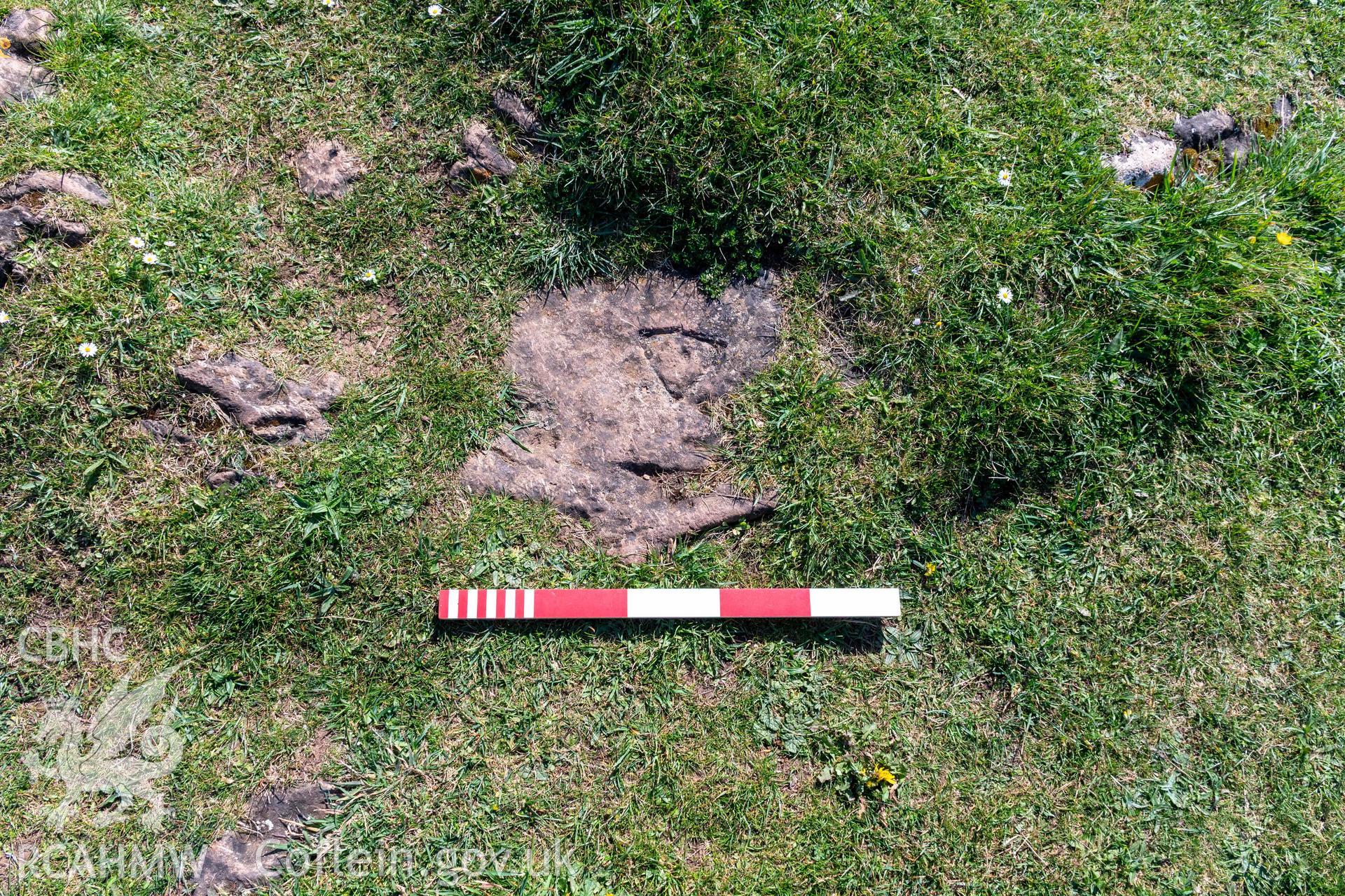 Sully Island Promontory Fort. Possible bench mark cut into rock associated with round barrow at eastern tip of the island.