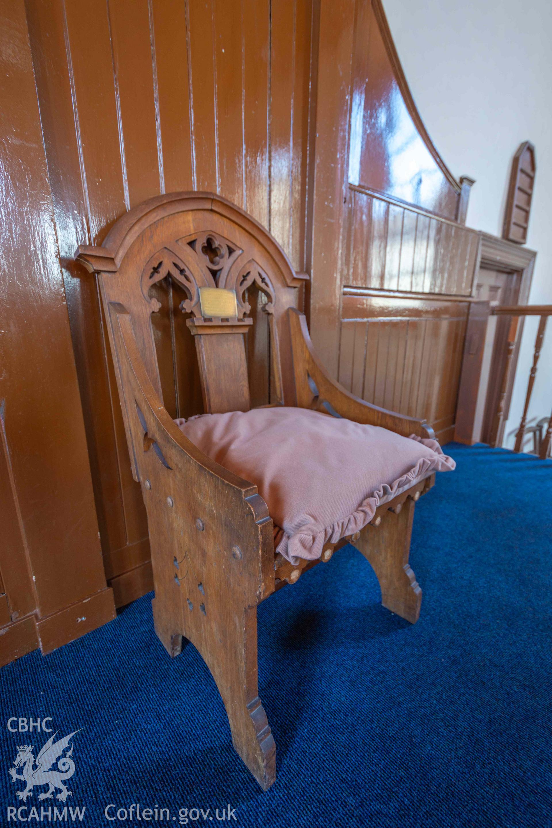 Zion Baptist Chapel - Interior: View of the ornate wooden chair on the pulpit, taken from East