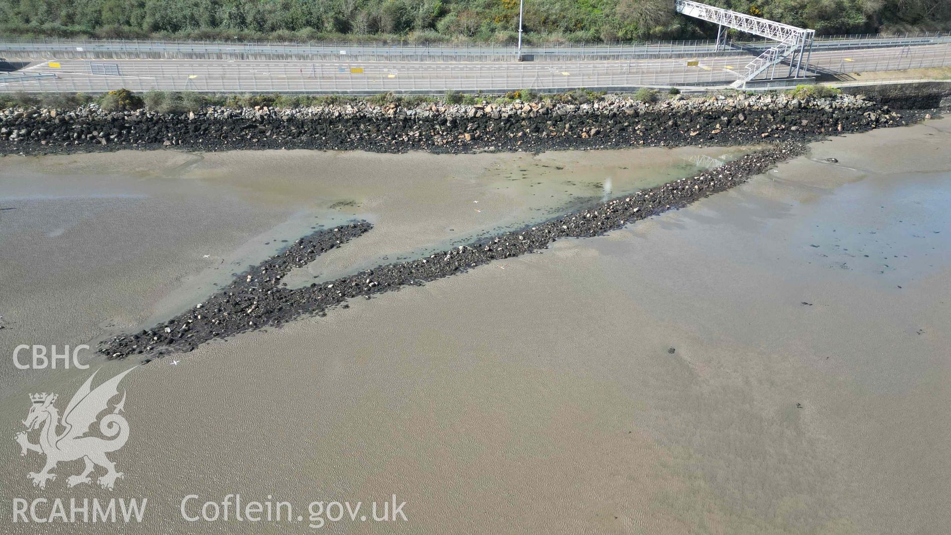 Oblique view of Goodwick Fish Trap 1 at low water on 30/03/2025, looking northwest.