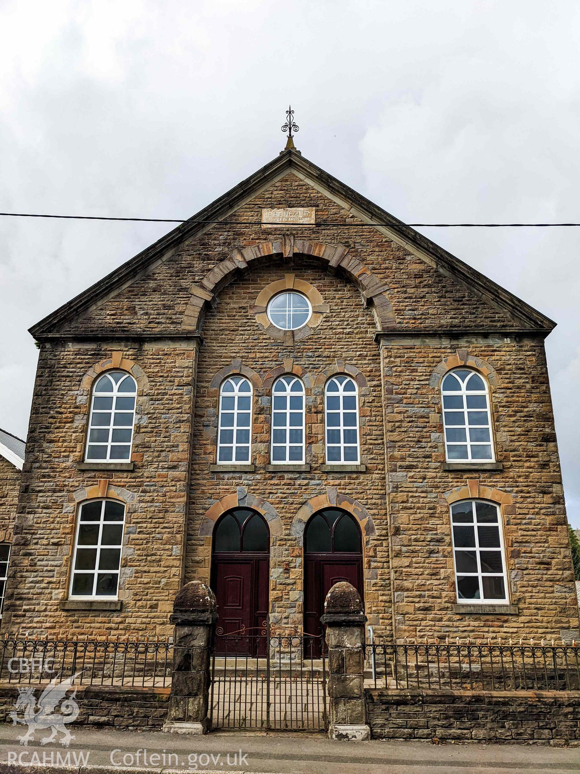 Front (south) elevation, low angle. Portrait.