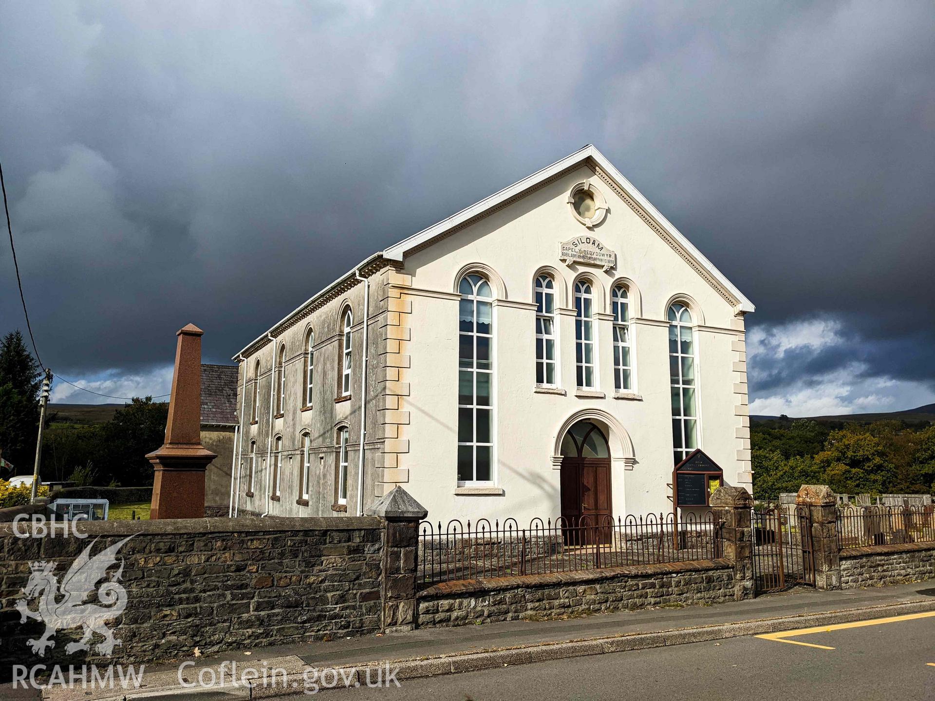 Front (south) and side (west) elevations, looking north