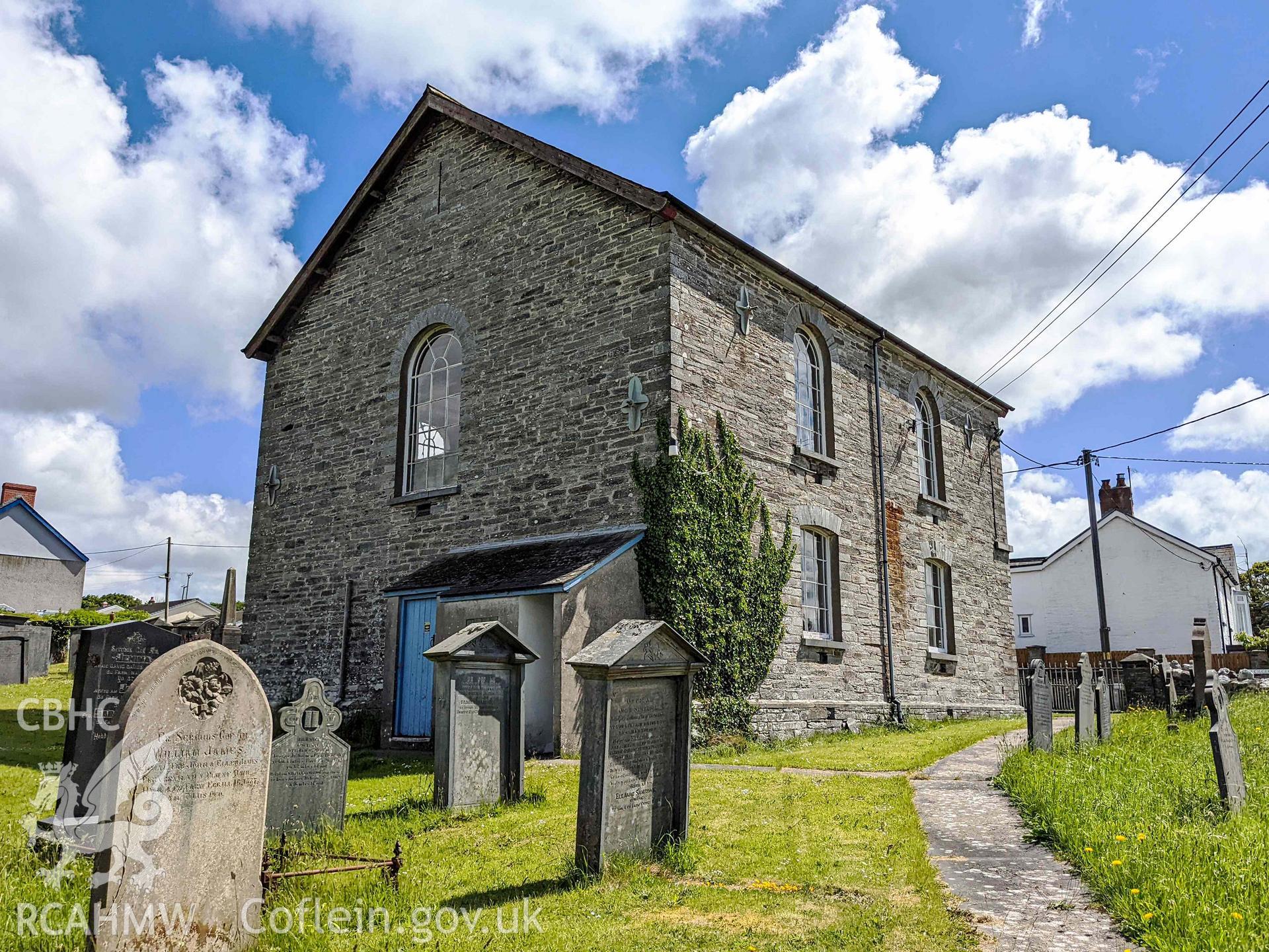 Rear (north) and side (west) elevations, from cemetery