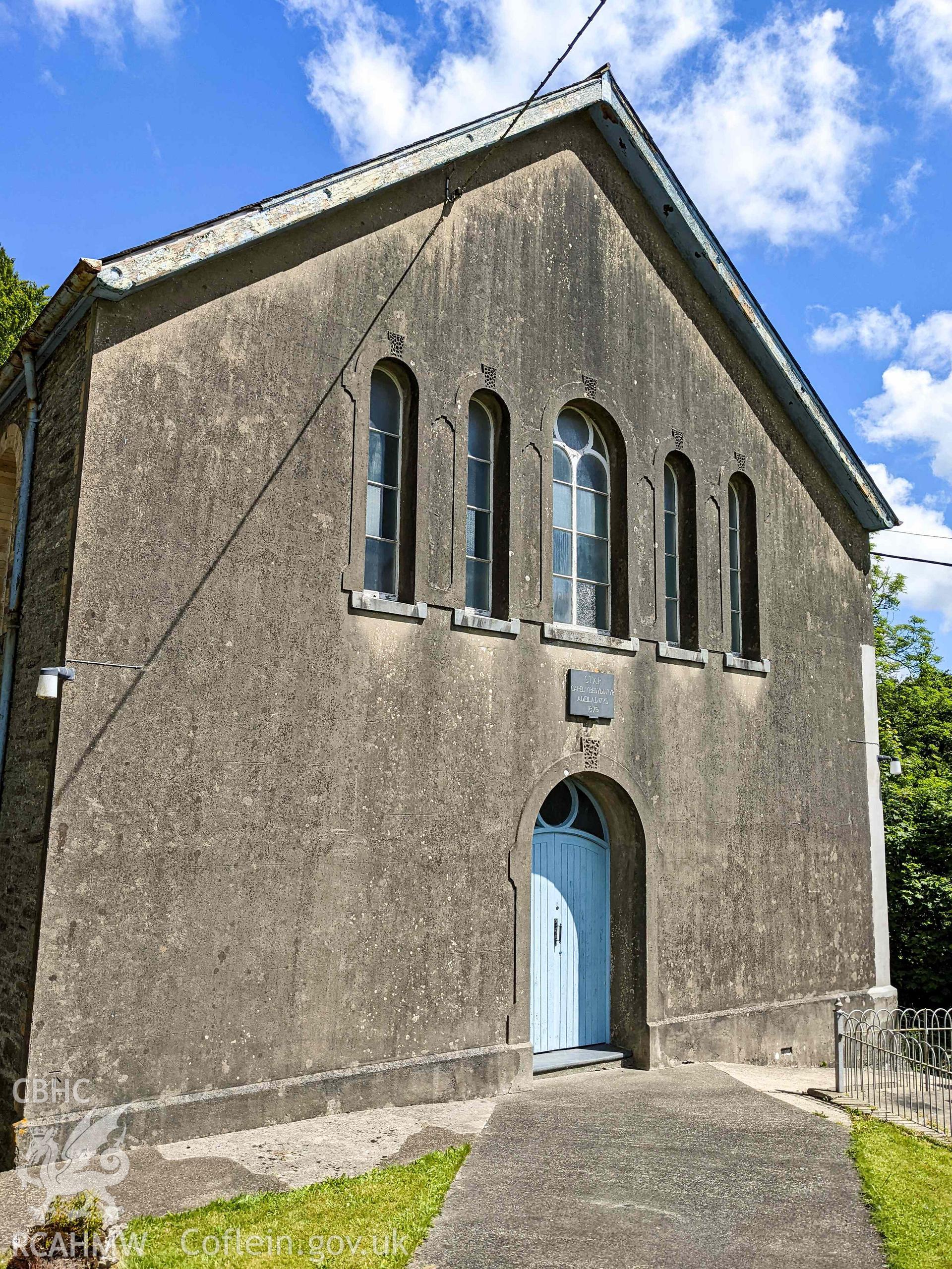 Front (west) elevation, taken from footpath to main entrance. Looking south east