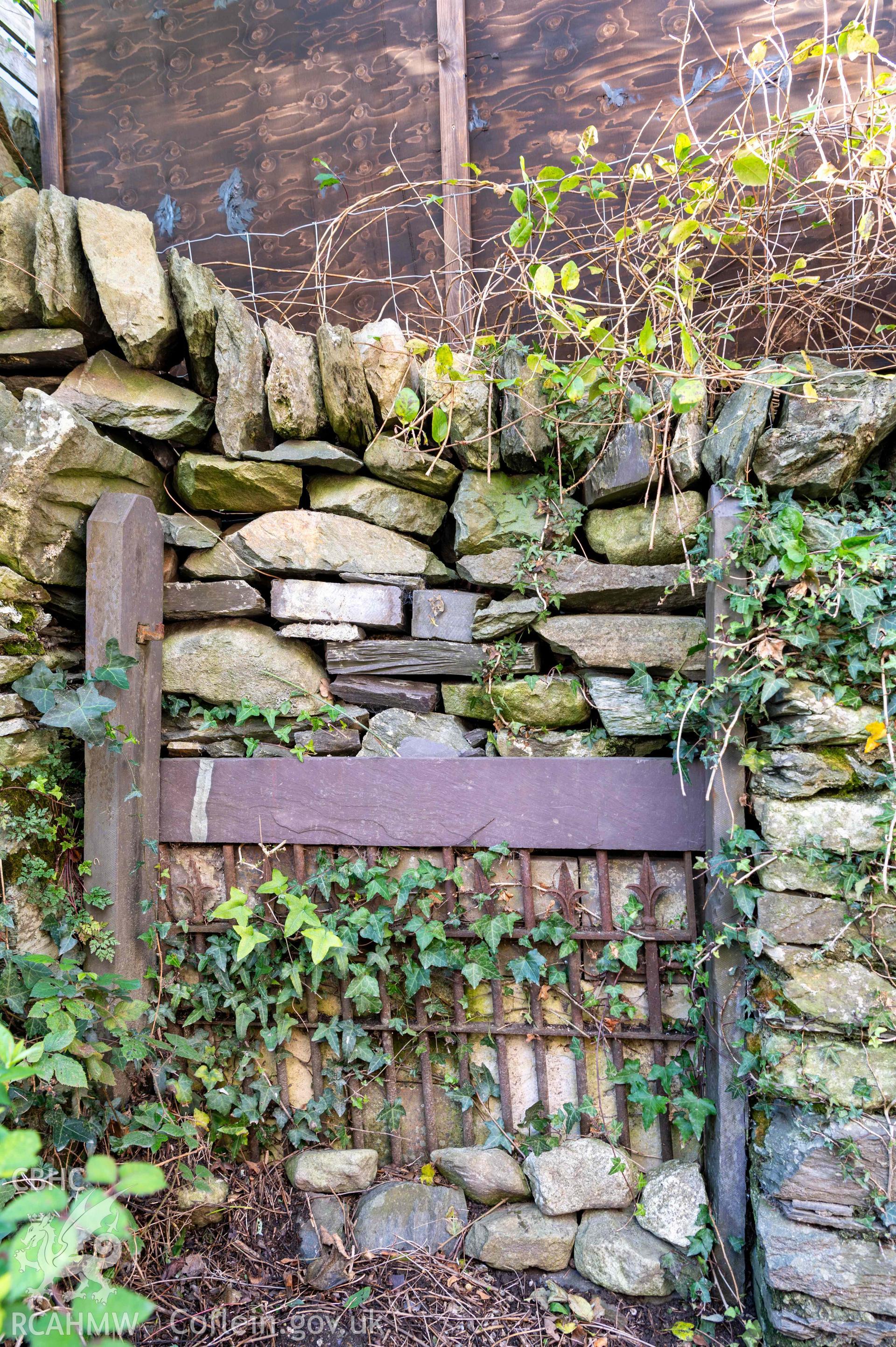 Jerusalem Chapel - Exterior: View of a disused stile embedded in the Western exterior wall, taken from South-East