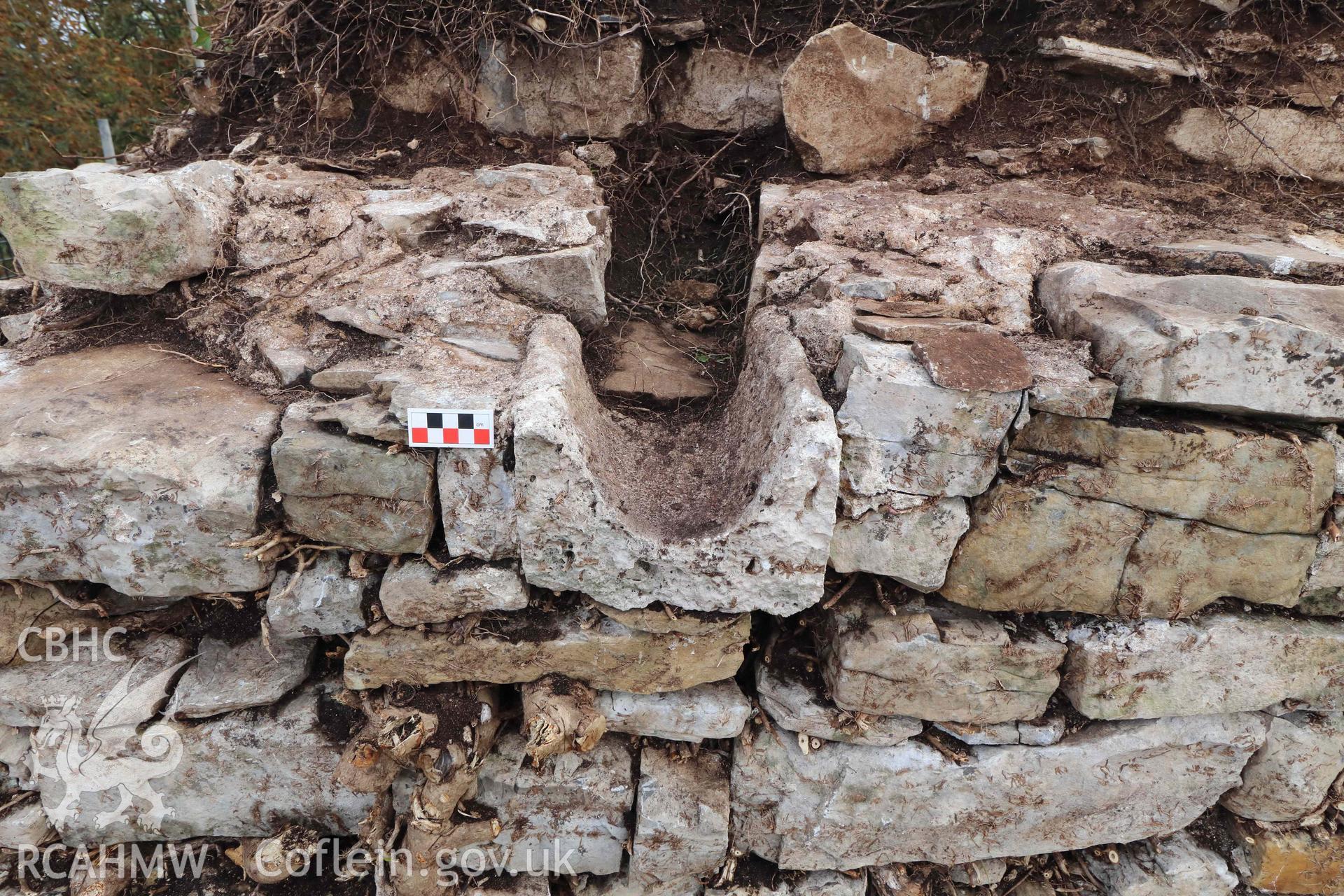 Photograph showing remains of drainage scupper made from Sutton Stone at top of Southwest wall, from an Archaeological Building Investigation, Recording & Watching Brief of Melefant Castle, Llanmaes, produced by Richard Scott Jones of Heritage Recording Service Wales, June 2024.