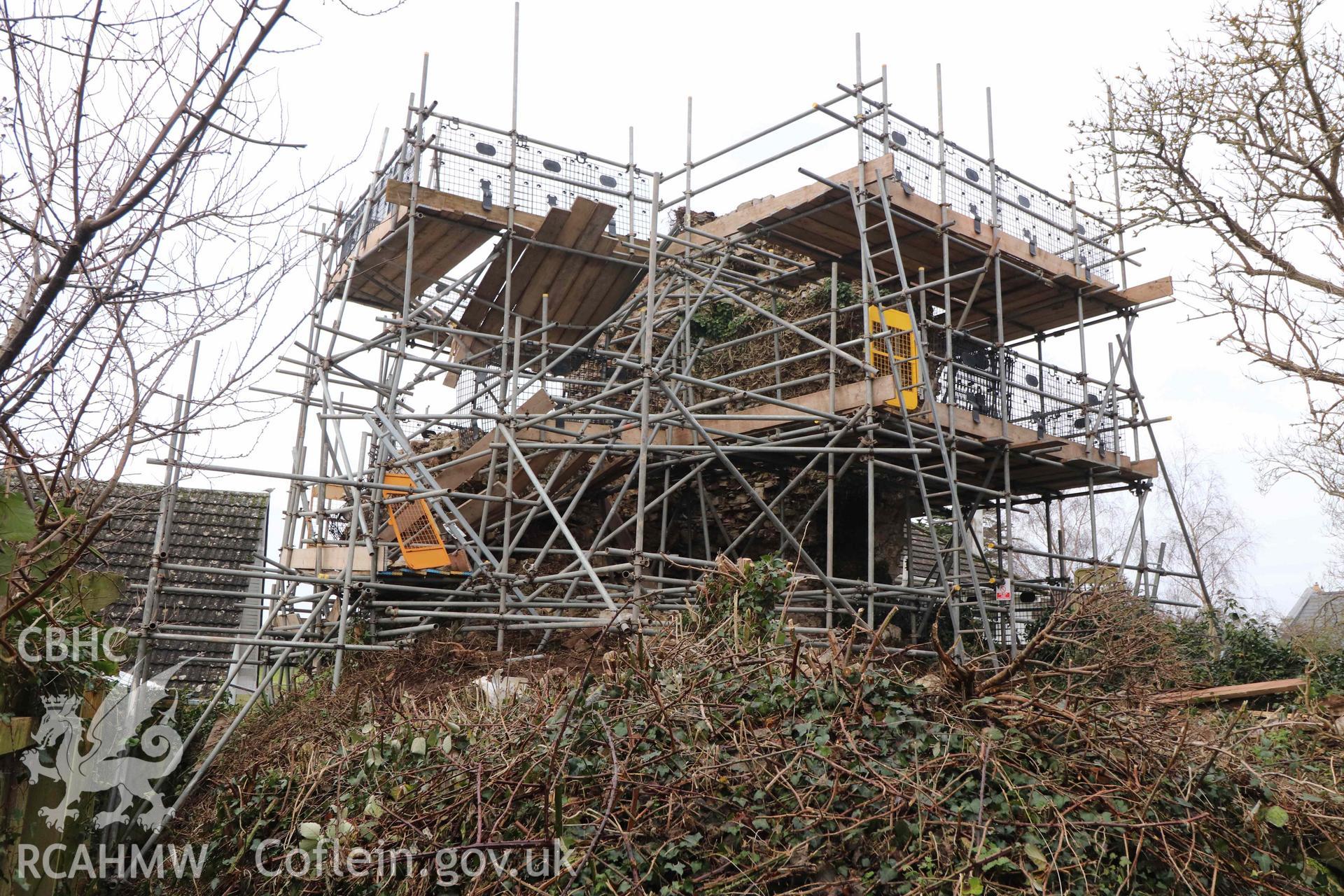 Photograph showing of standing remains with scaffold erected, from an Archaeological Building Investigation, Recording & Watching Brief of Melefant Castle, Llanmaes, produced by Richard Scott Jones of Heritage Recording Service Wales, June 2024.