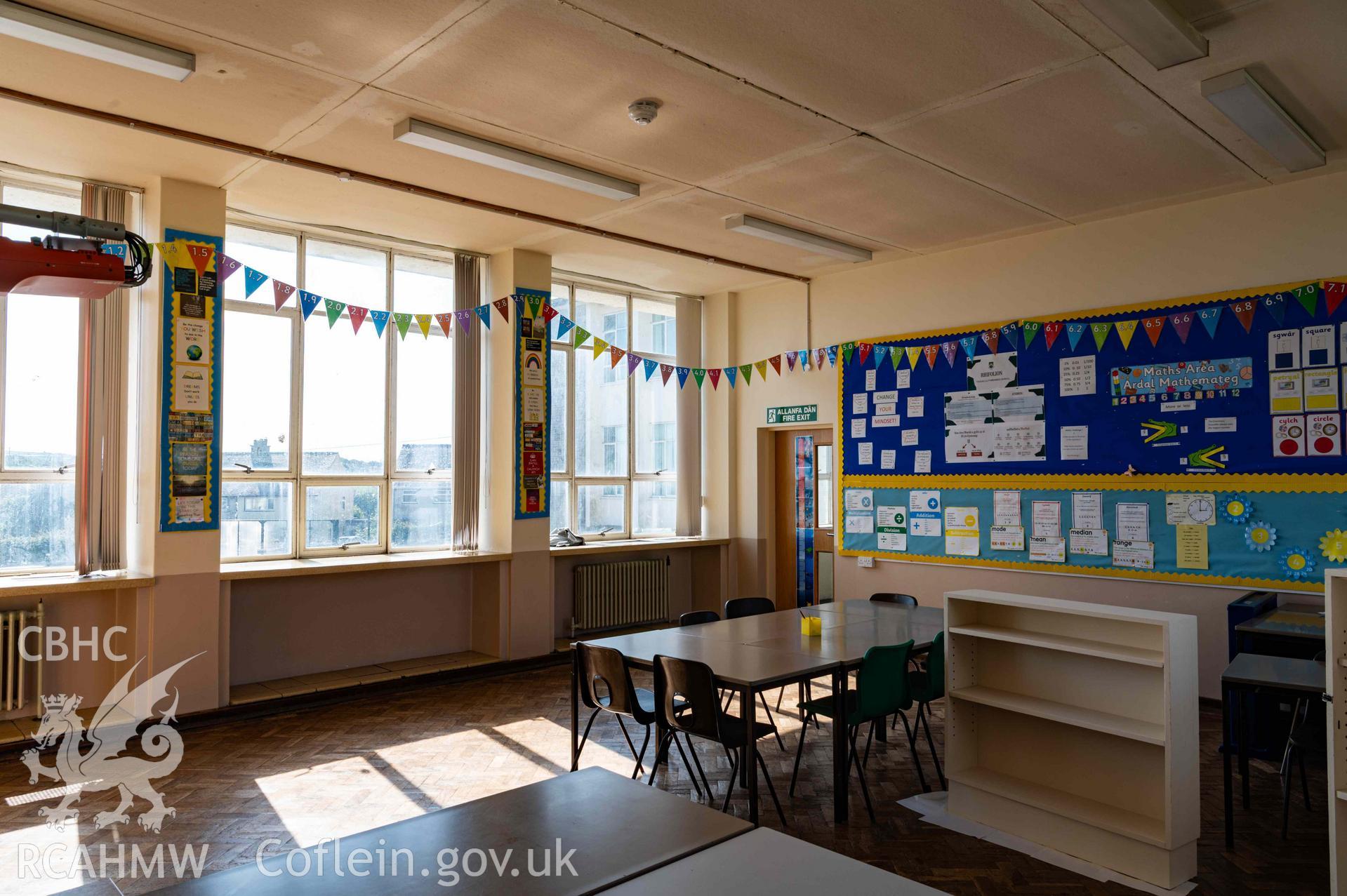 Classroom, south range first floor. View to south west corner door leading through to next classroom
