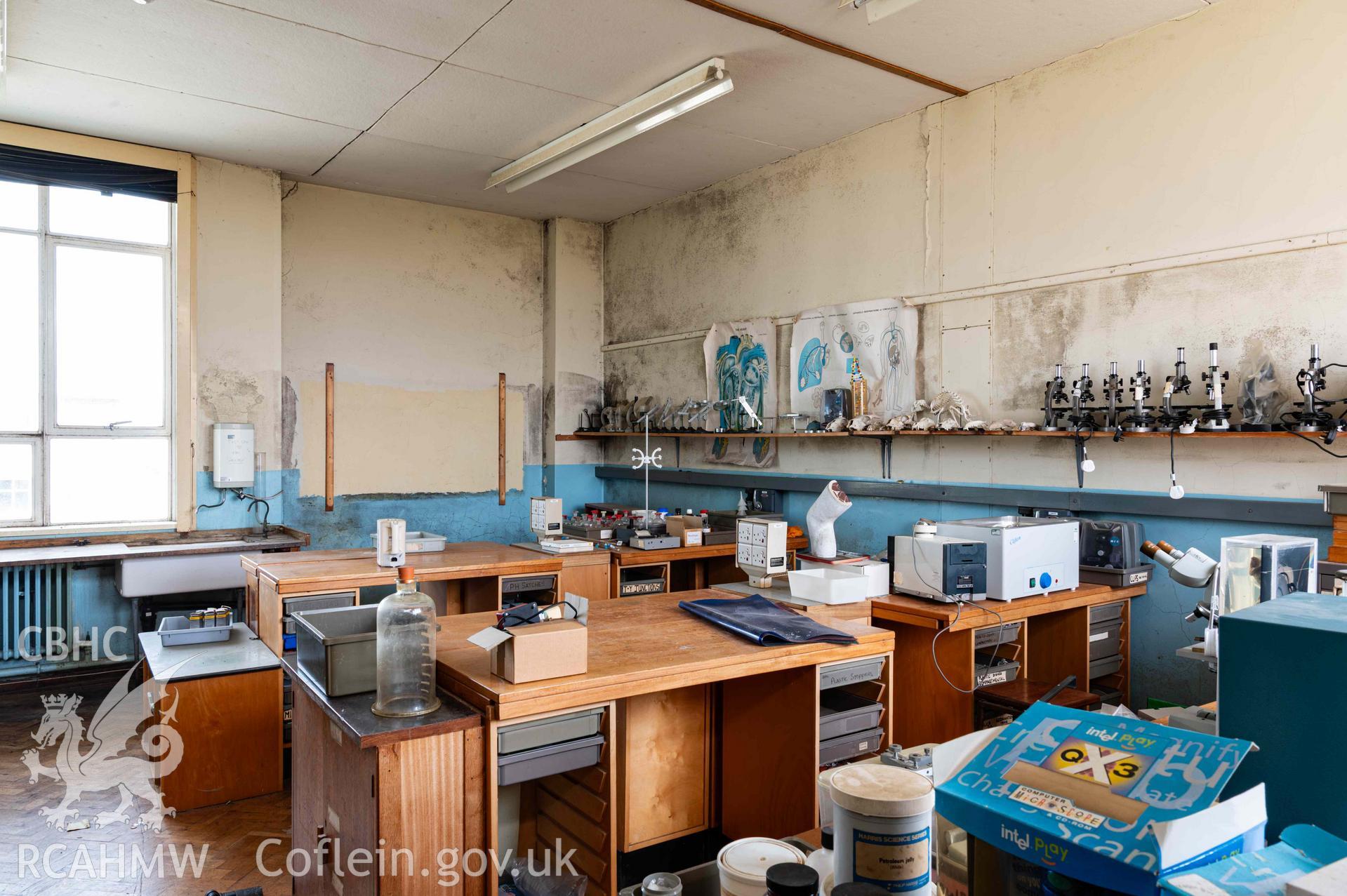 Laboratory preparation room. End of south range, second floor. Microscopes and animal skeletons on shelf