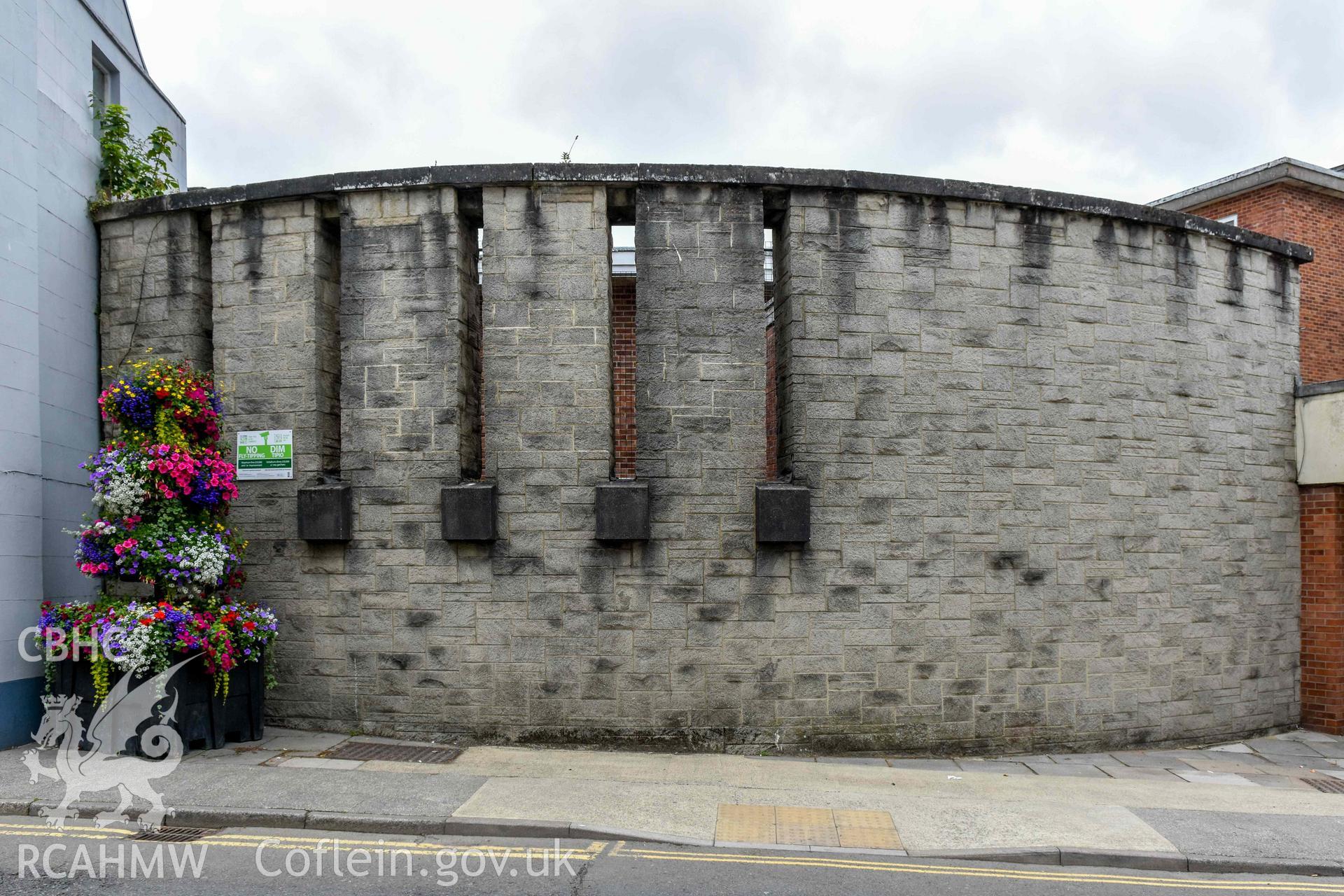 Haverfordwest County Library - Exterior: View of the curved stone wall on the Library's Eastern elevation, taken from East