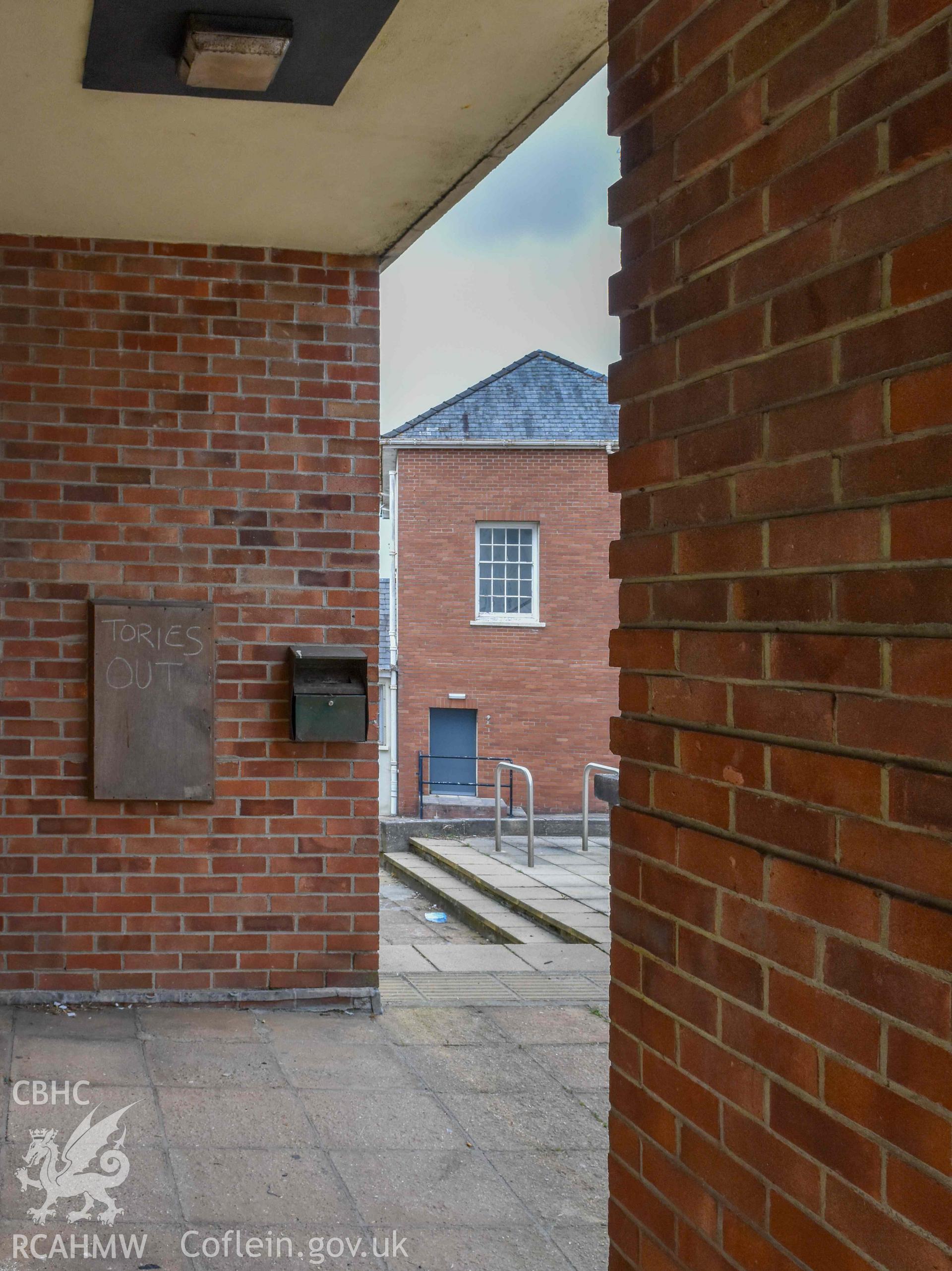 Haverfordwest County Library - Exterior: View of a sheltered area of the forecourt outside the main entrance, taken from South