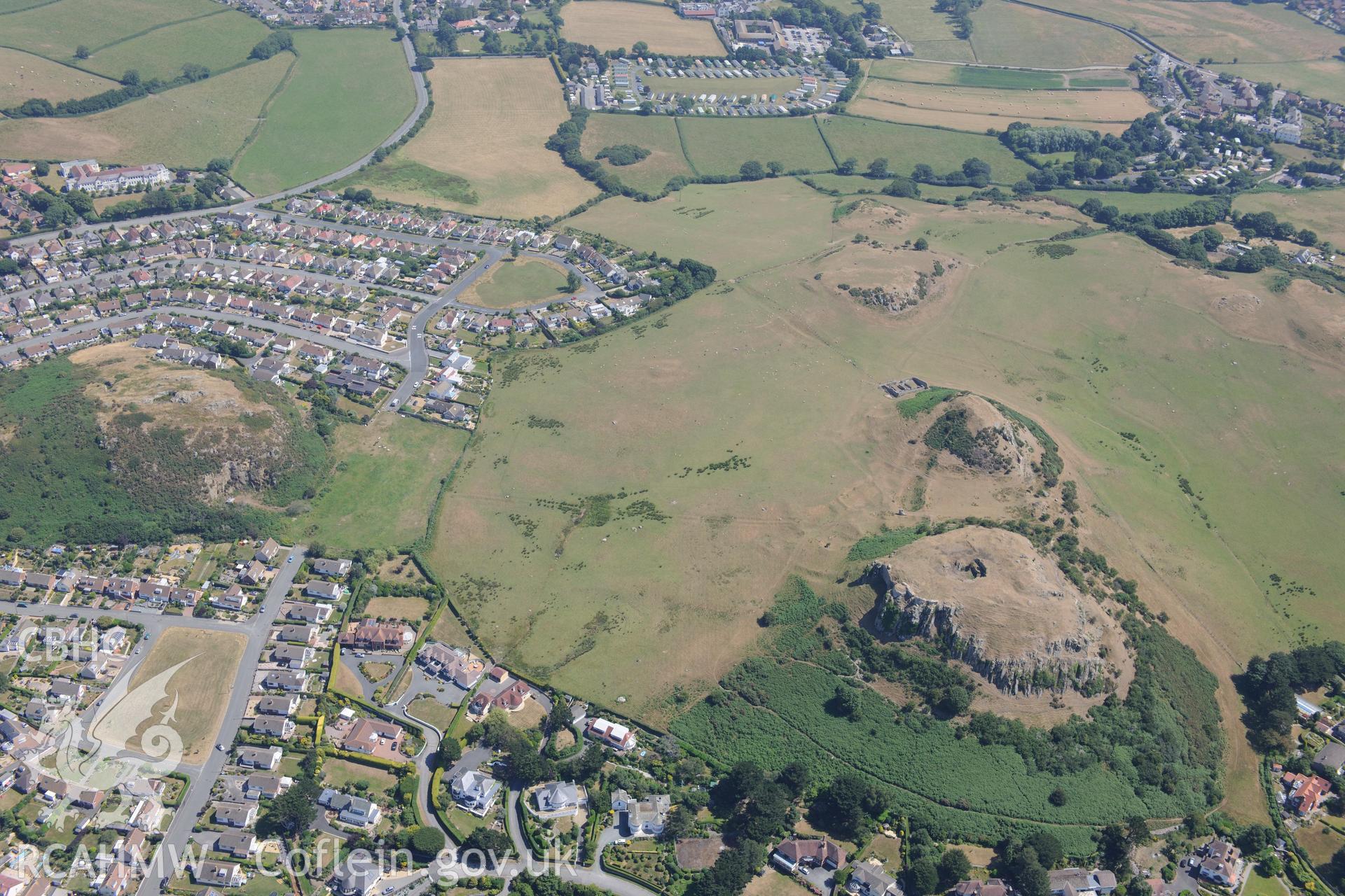 Oblique aerial photograph taken during the Royal Commission’s programme of archaeological aerial reconnaissance: Deganwy Castle - View with drought parching