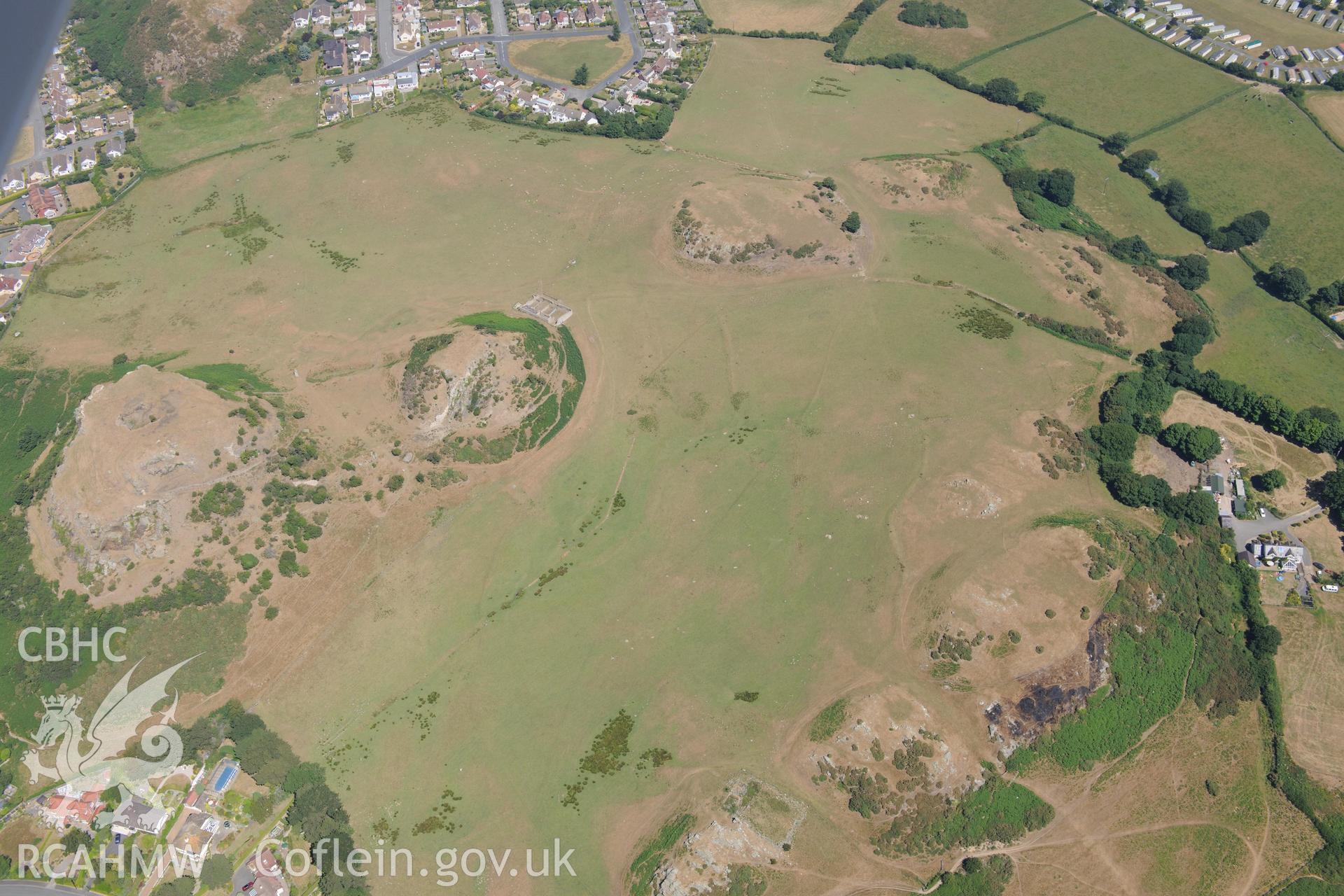 Oblique aerial photograph taken during the Royal Commission’s programme of archaeological aerial reconnaissance: Deganwy Castle - View with drought parching