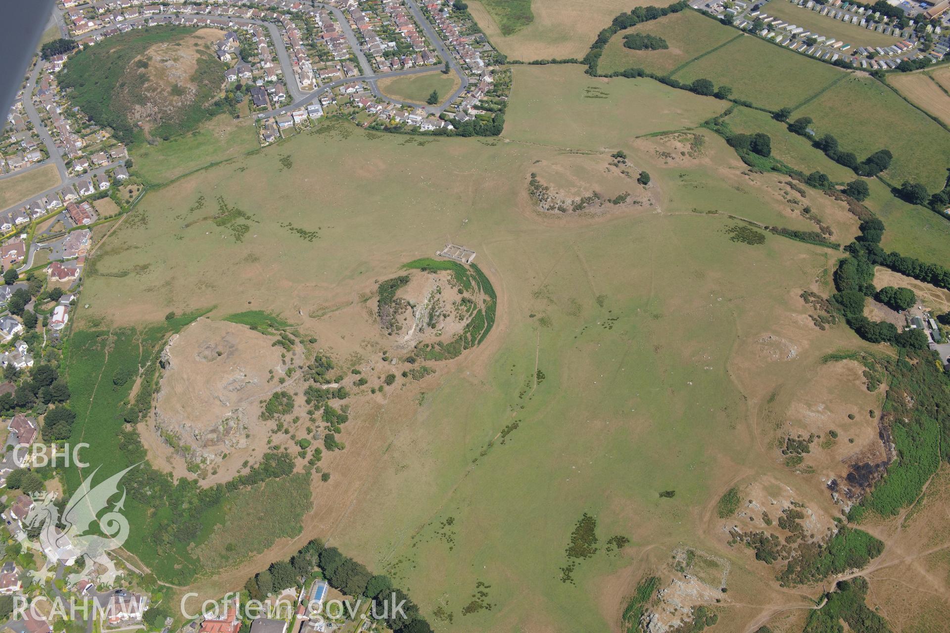 Oblique aerial photograph taken during the Royal Commission’s programme of archaeological aerial reconnaissance: Deganwy Castle - View with drought parching