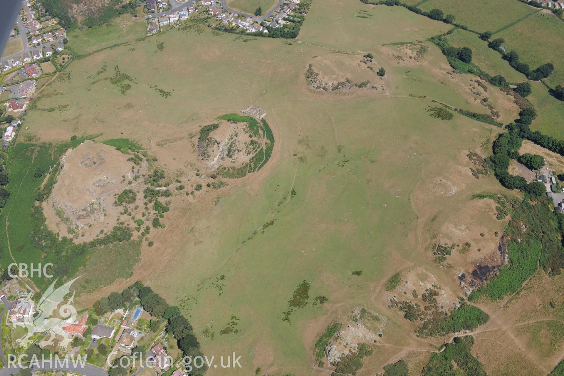 Oblique aerial photograph taken during the Royal Commission’s programme of archaeological aerial reconnaissance: Deganwy Castle - View with drought parching