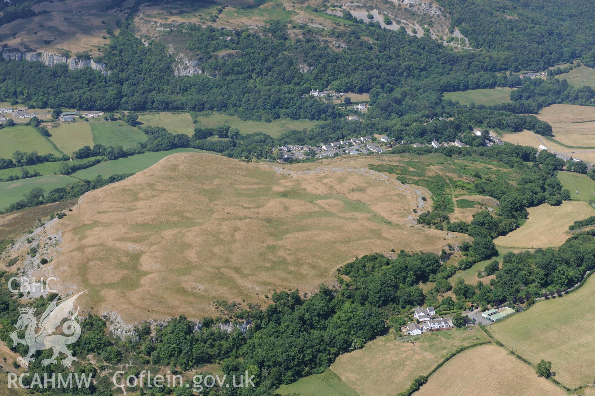 Oblique aerial photograph taken during the Royal Commission’s programme of archaeological aerial reconnaissance: Pen-y-Corddyn-Mawr hillfort - View with drought parching
