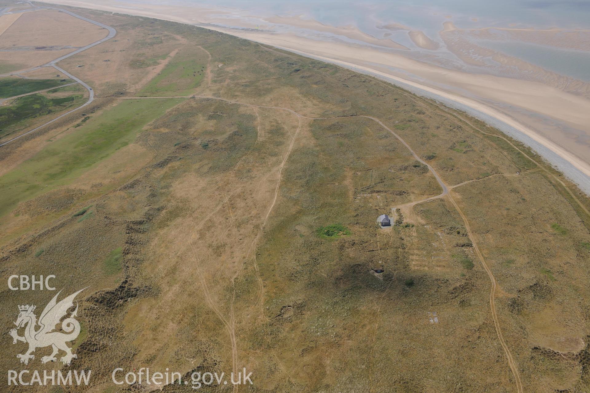 Oblique aerial photograph taken during the Royal Commission’s programme of archaeological aerial reconnaissance: Llandwrog Airfield, minefield - View of minefield in coastal dunes from north
