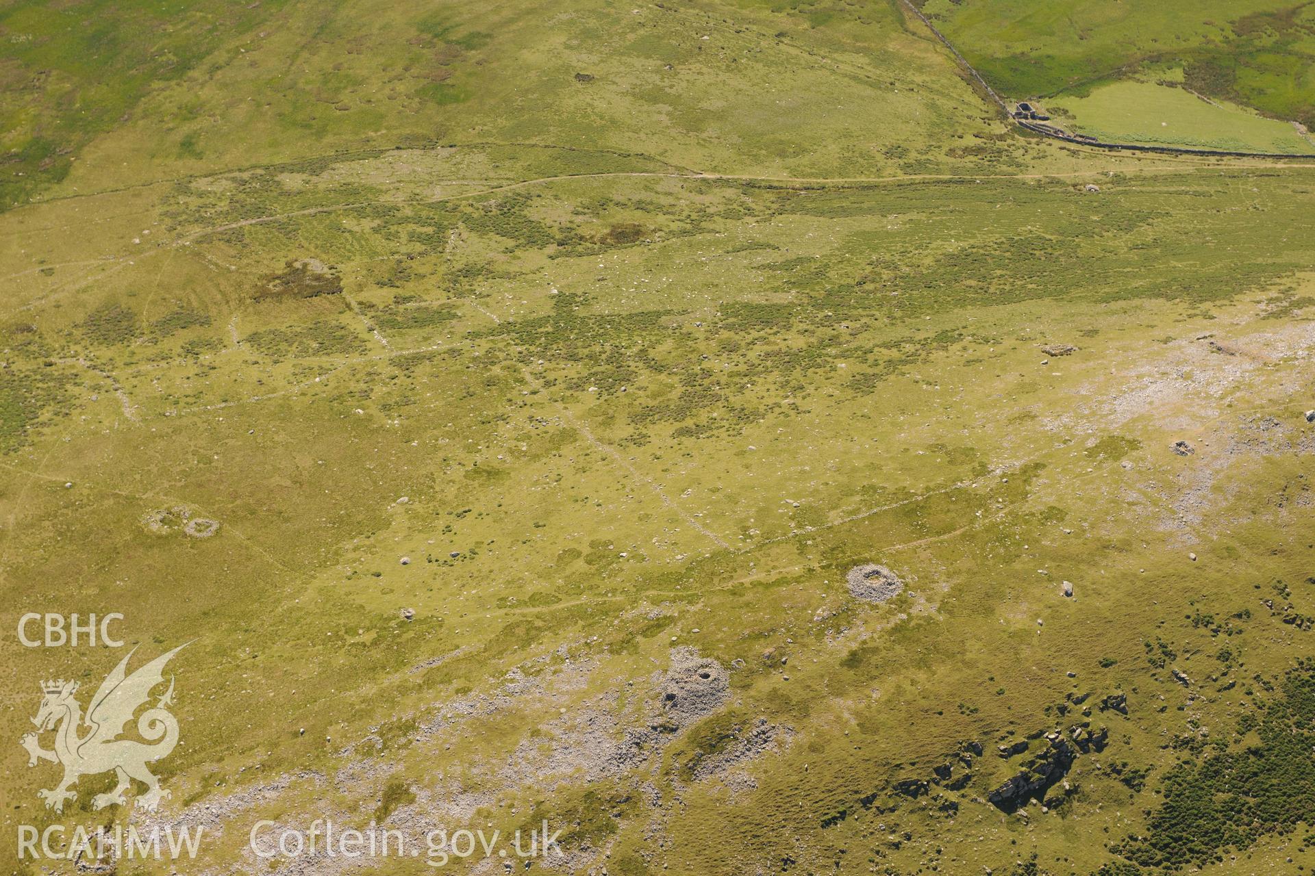 Oblique aerial photograph taken during the Royal Commission’s programme of archaeological aerial reconnaissance: Moel Faban cairn cemetery - View from west