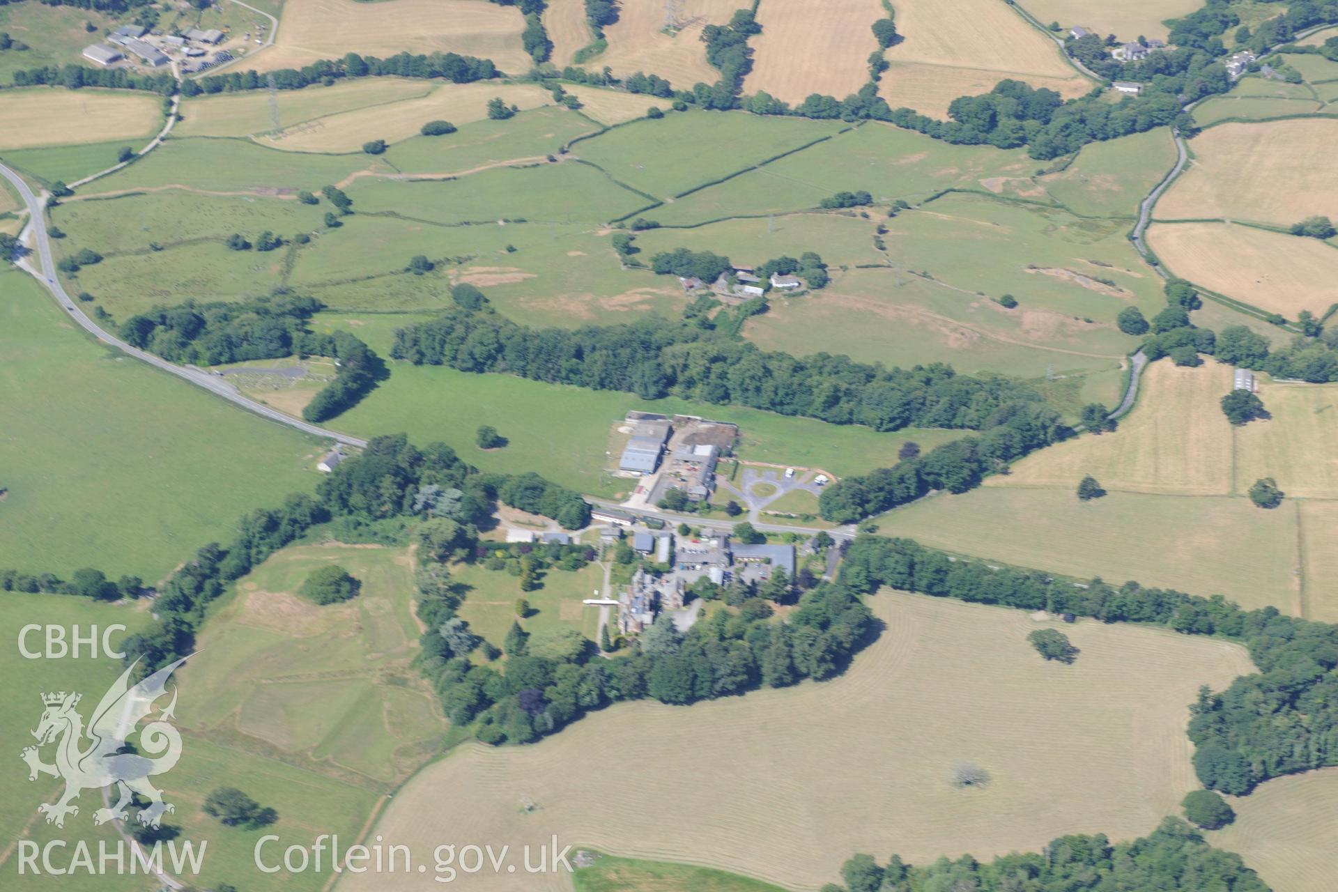 Oblique aerial photograph taken during the Royal Commission’s programme of archaeological aerial reconnaissance: Caerhun Hall - Caerhun Hall and gardens