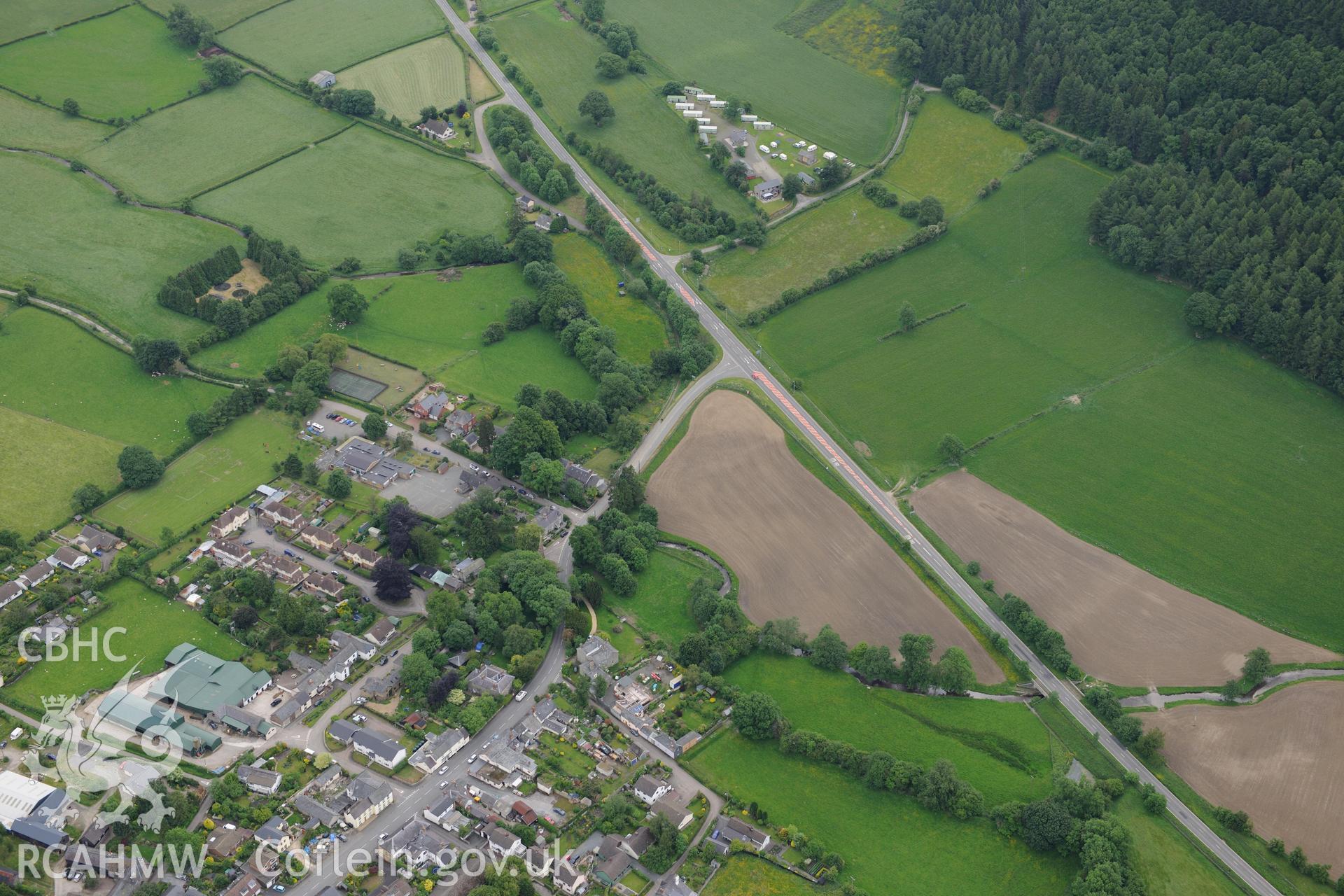 Oblique aerial photograph taken during the Royal Commission’s programme of archaeological aerial reconnaissance: New Radnor, town defences-View of southern defences with ploughing
