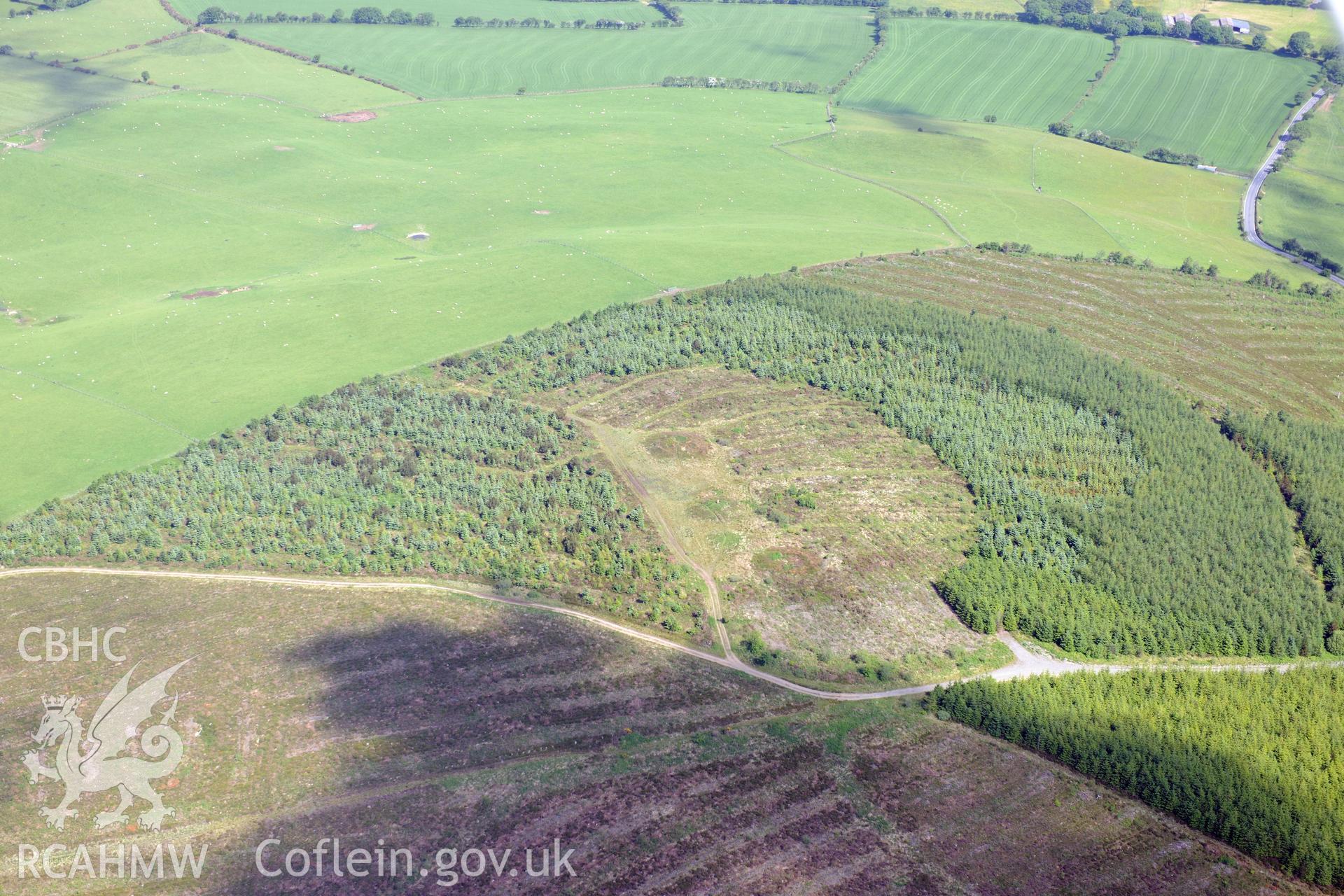 Oblique aerial photograph taken during the Royal Commission’s programme of archaeological aerial reconnaissance: Trichrug round barrows-View from the south-east