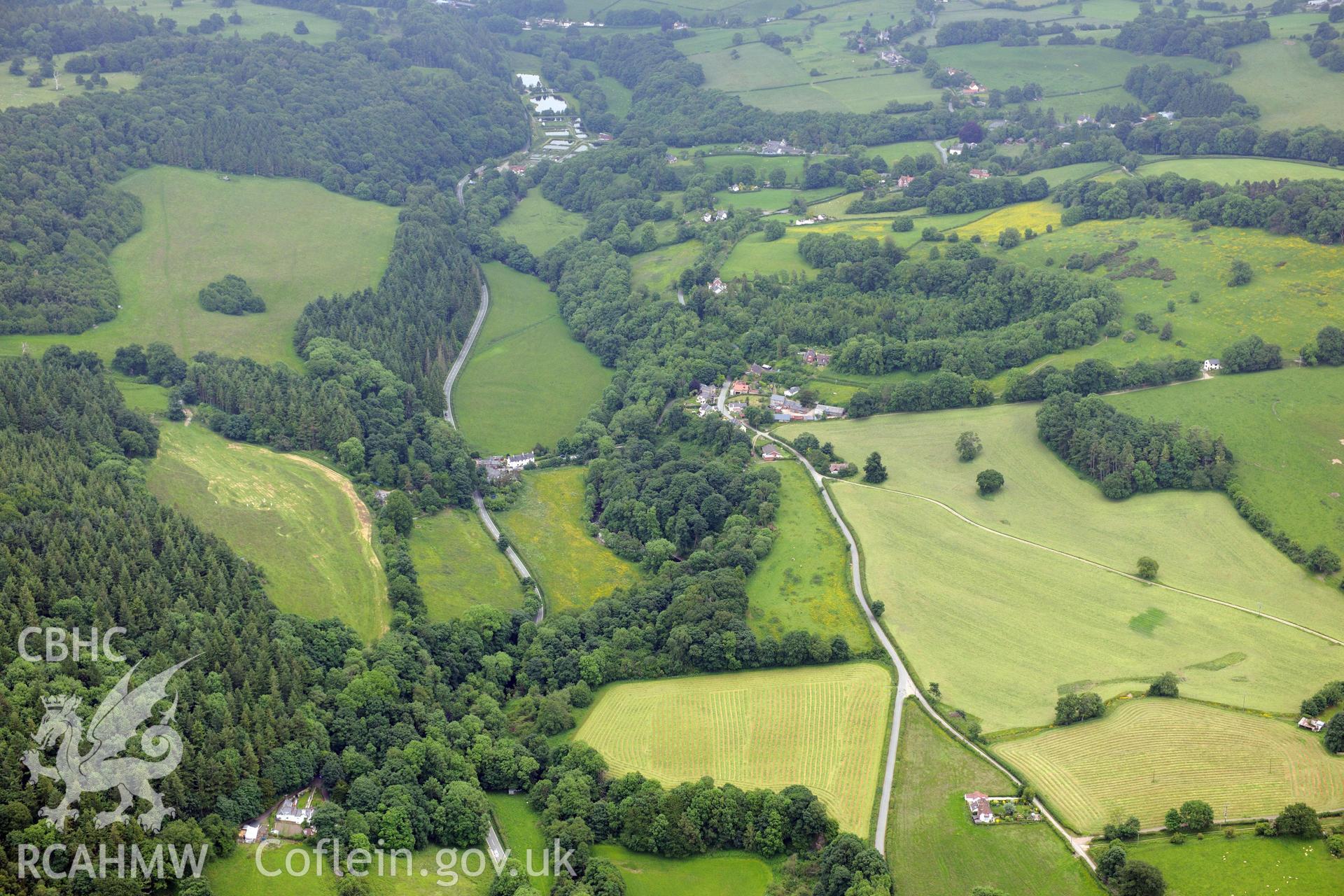 Oblique aerial photograph taken during the Royal Commission’s programme of archaeological aerial reconnaissance: Offa's Dyke-Chirk Castle section, from west