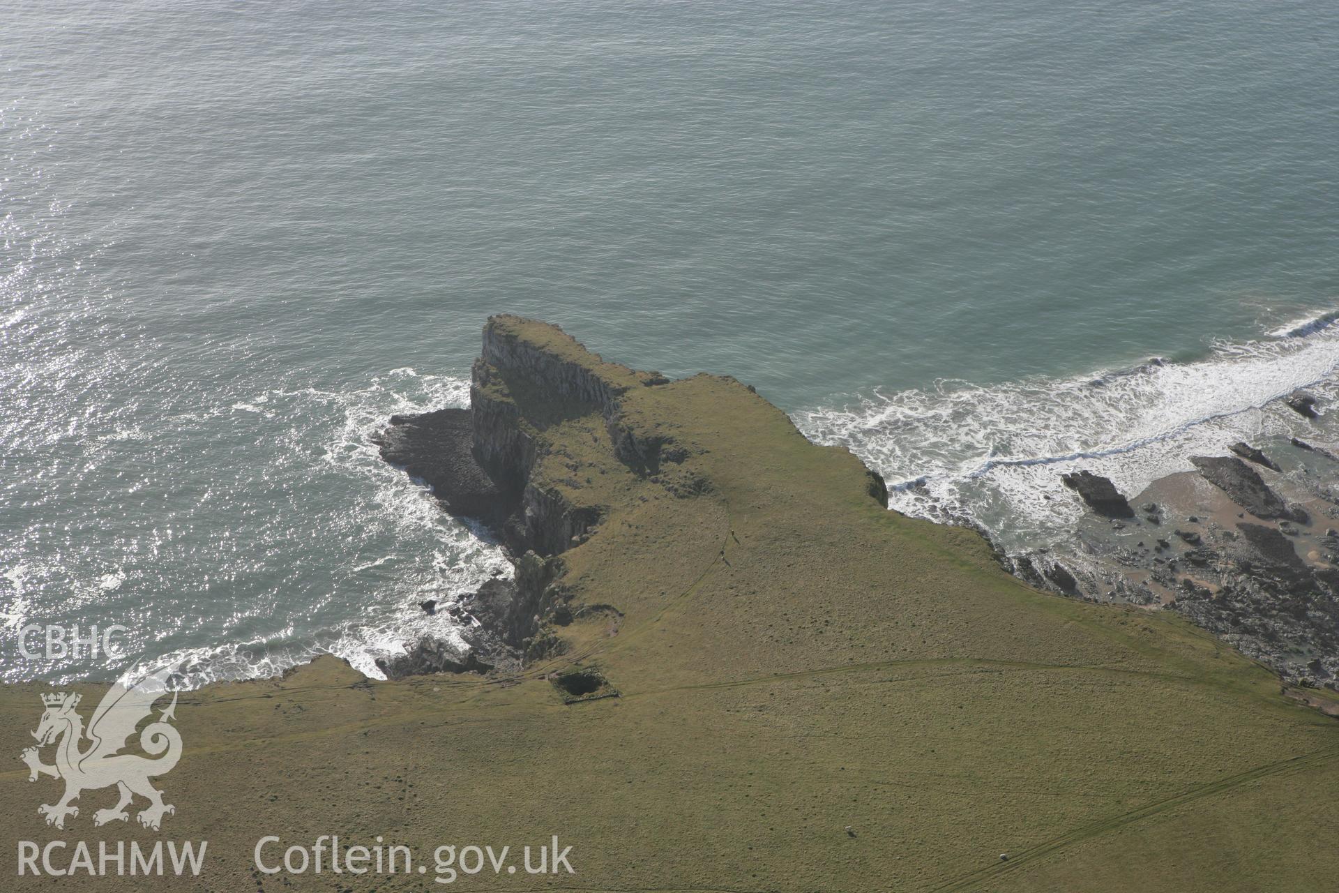 RCAHMW colour oblique aerial photograph of Mowingword Promontory Enclosure. Taken on 28 January 2009 by Toby Driver