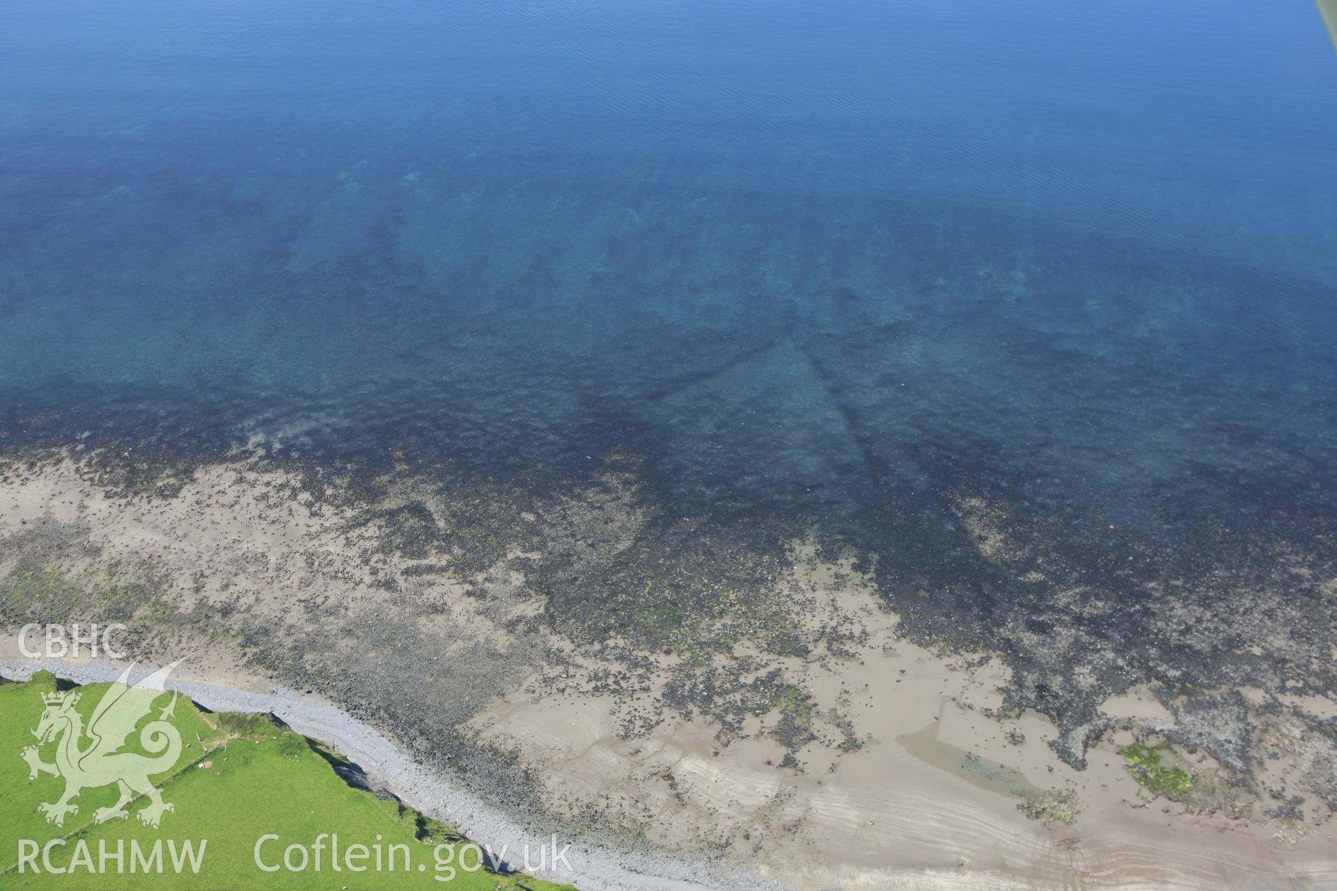 RCAHMW colour oblique aerial photograph of Mynachdy'r-Graig Fish Trap I. Taken on 02 June 2009 by Toby Driver