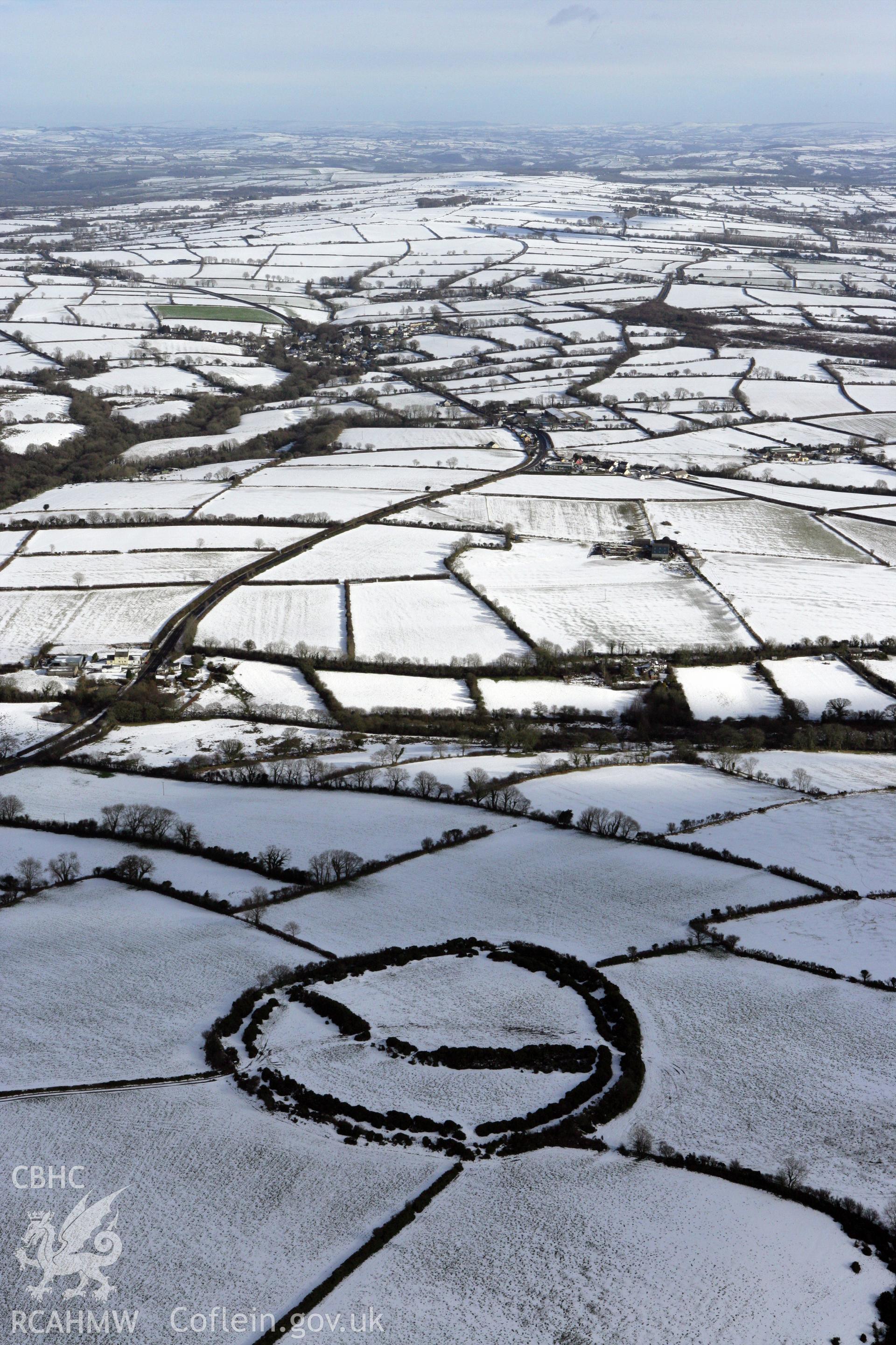 RCAHMW colour oblique photograph of Castell Mawr. Taken by Toby Driver on 06/02/2009.