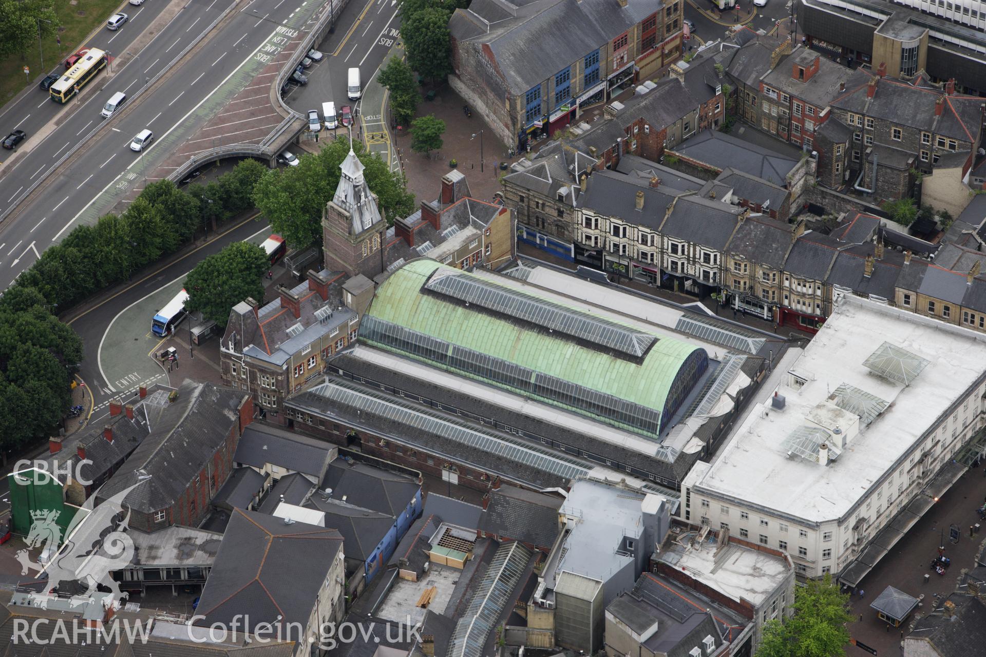 RCAHMW colour oblique aerial photograph of Newport Market, Upper Dock Street and High Street, Newport. Taken on 09 July 2009 by Toby Driver
