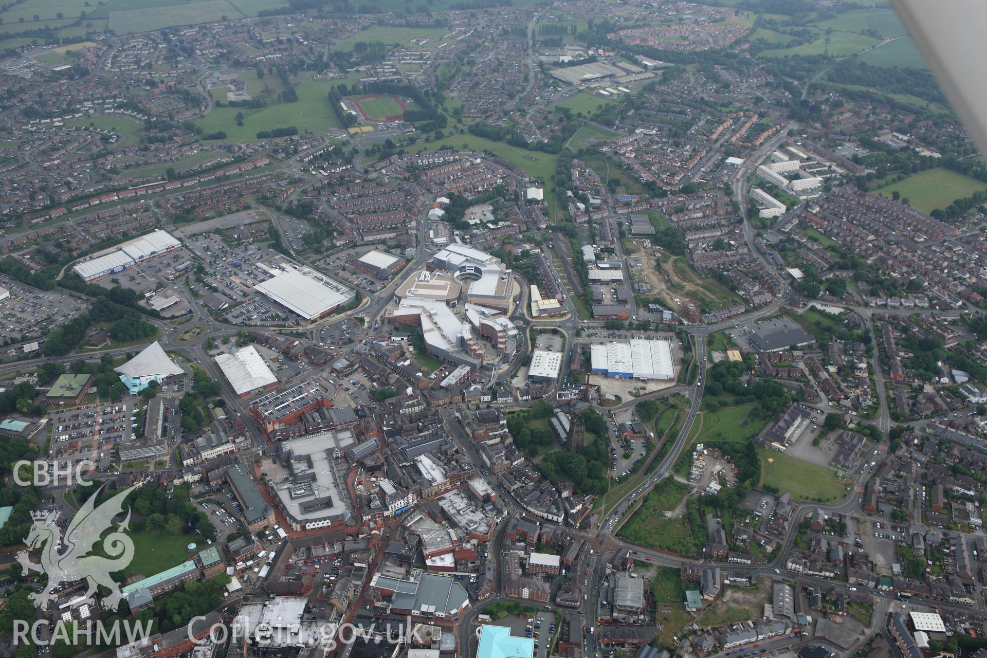 RCAHMW colour oblique aerial photograph of Wrexham showing the town centre. Taken on 29 June 2009 by Toby Driver