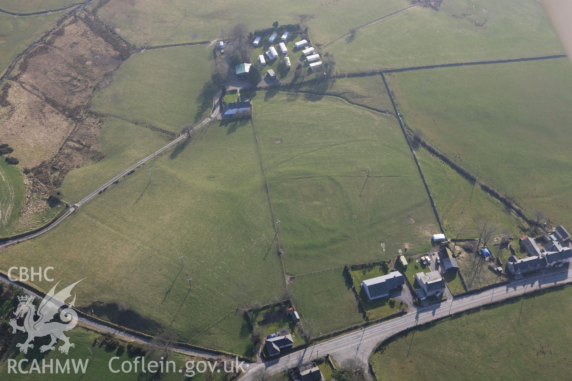 RCAHMW colour oblique photograph of Bryn Teg enclosed settlement. Taken by Toby Driver on 18/03/2009.