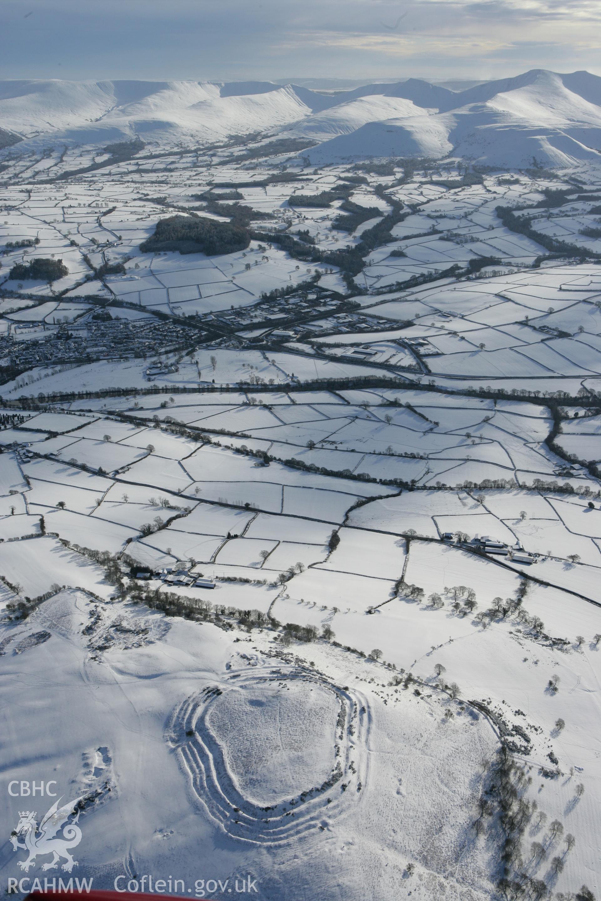 RCAHMW colour oblique photograph of Pen y Crug hillfort. Taken by Toby Driver on 06/02/2009.