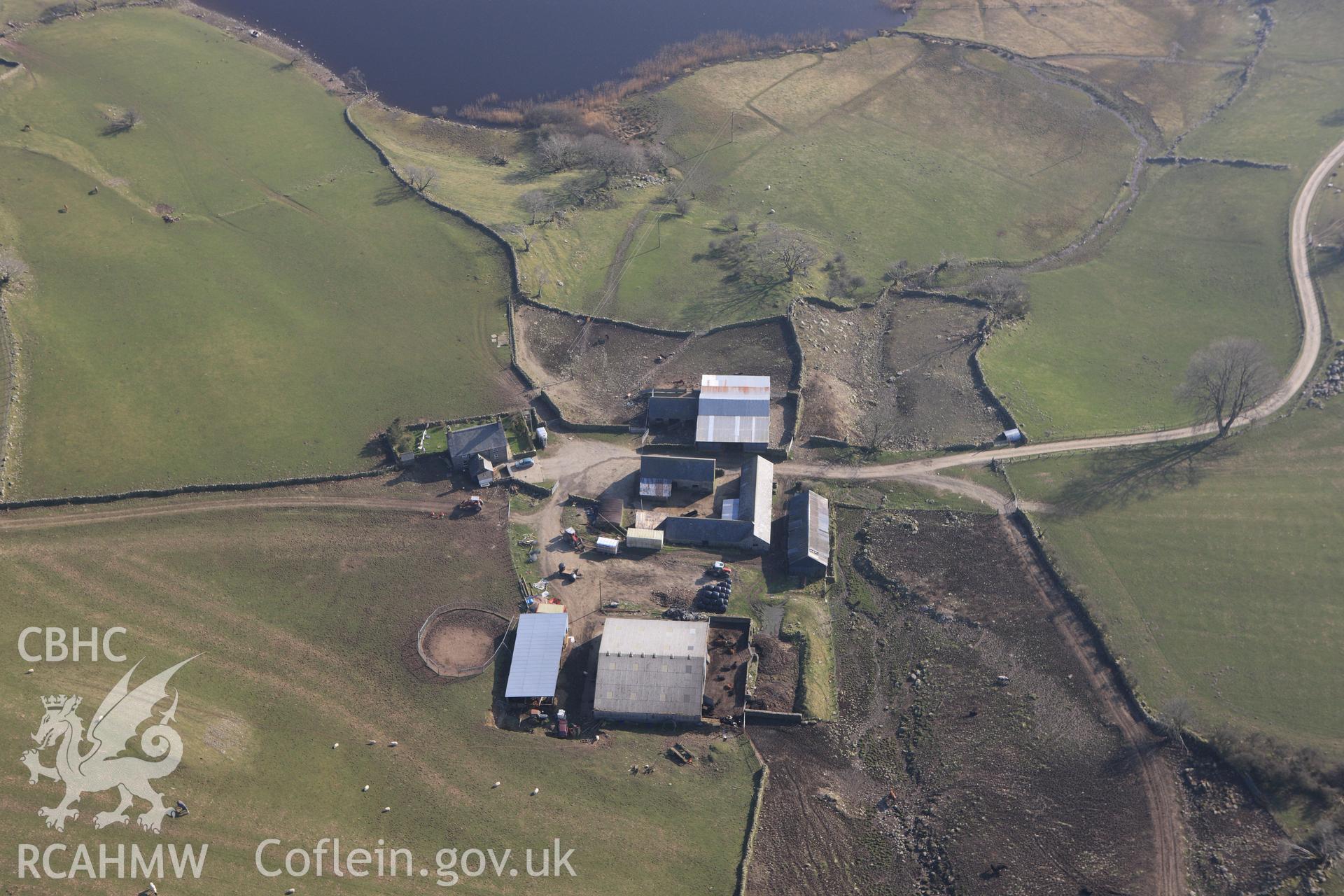 RCAHMW colour oblique photograph of Cwrt-y-Llyn, farmhouse. Taken by Toby Driver on 18/03/2009.