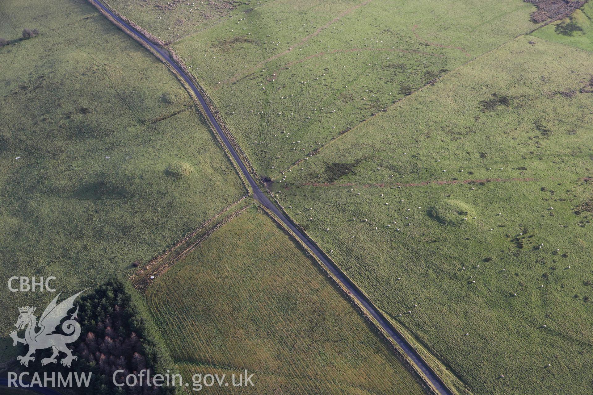 RCAHMW colour oblique aerial photograph of Rhiw Porthnant Barrow I. Taken on 10 December 2009 by Toby Driver